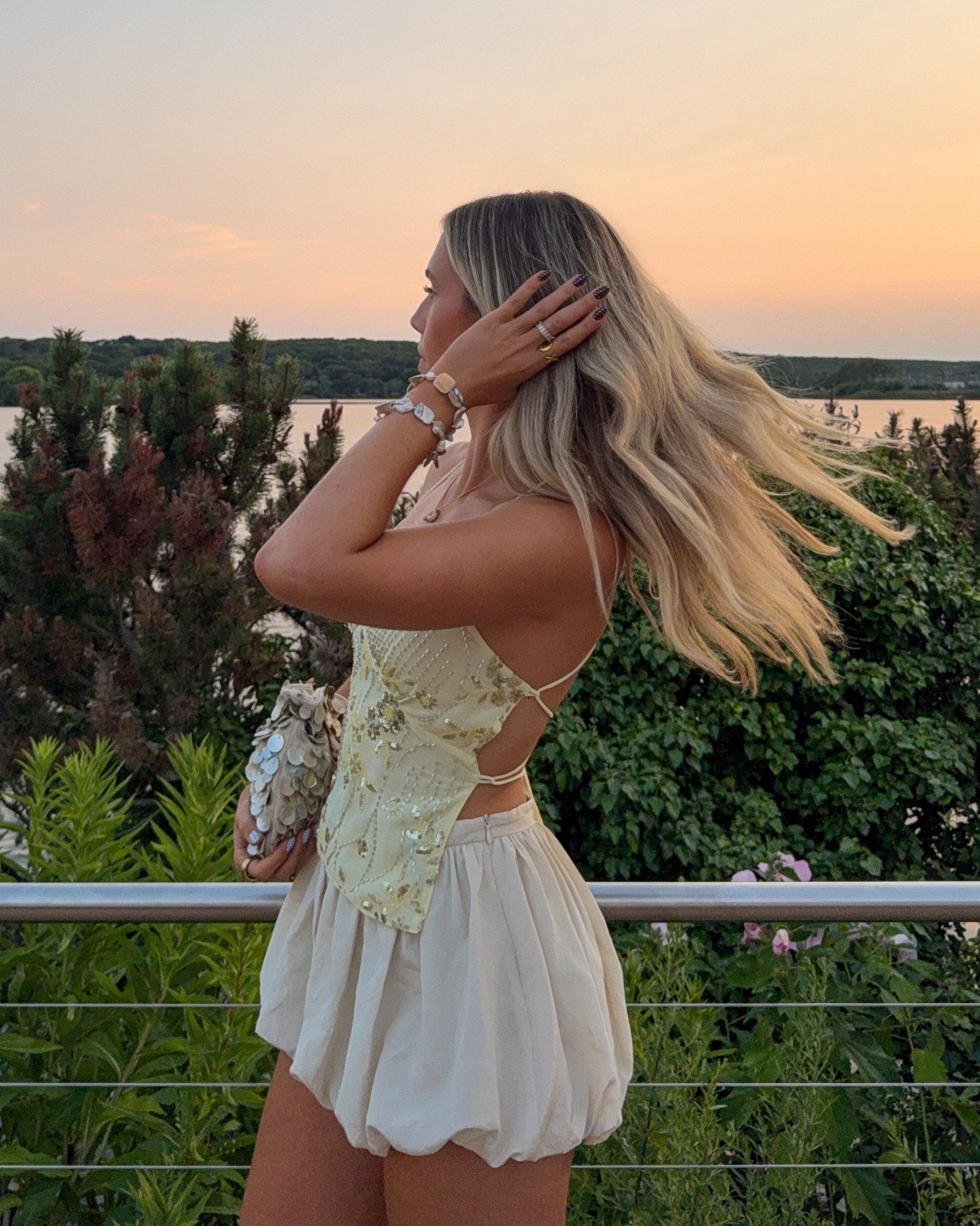 Beaded top with an open back and bubble shorts! Perfect vacation outfit 

#LTKFindsUnder100 #LTKStyleTip #LTKFindsUnder50