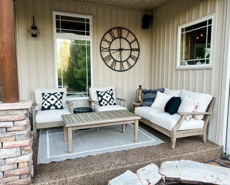 Our new outdoor furniture from Ashley furniture. I love how simple it is. Seen beee are two chairs, the loveseat, and a coffee table. Style is Clare eucalyptus wood. 

#LTKSeasonal #LTKhome