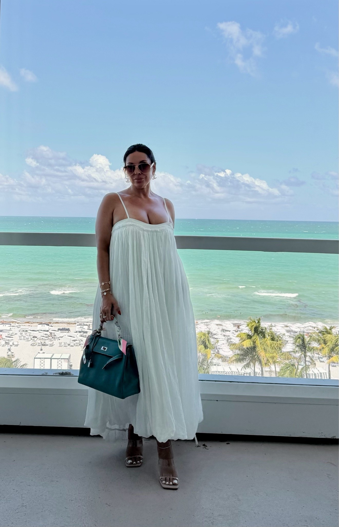 The summer vacation dress we all need 🤍 Soft flowy gauze with a cute open back and bow….. and it has POCKETS! Fully supported my chest without needing a bra and it was perfect for a day of shopping and exploring the city. Paired with my most comfortable clear heels and some luxe and luxe for less accessories ✨

Wearing size Medium

#LTKootd #LTKPetite #LTKTravel