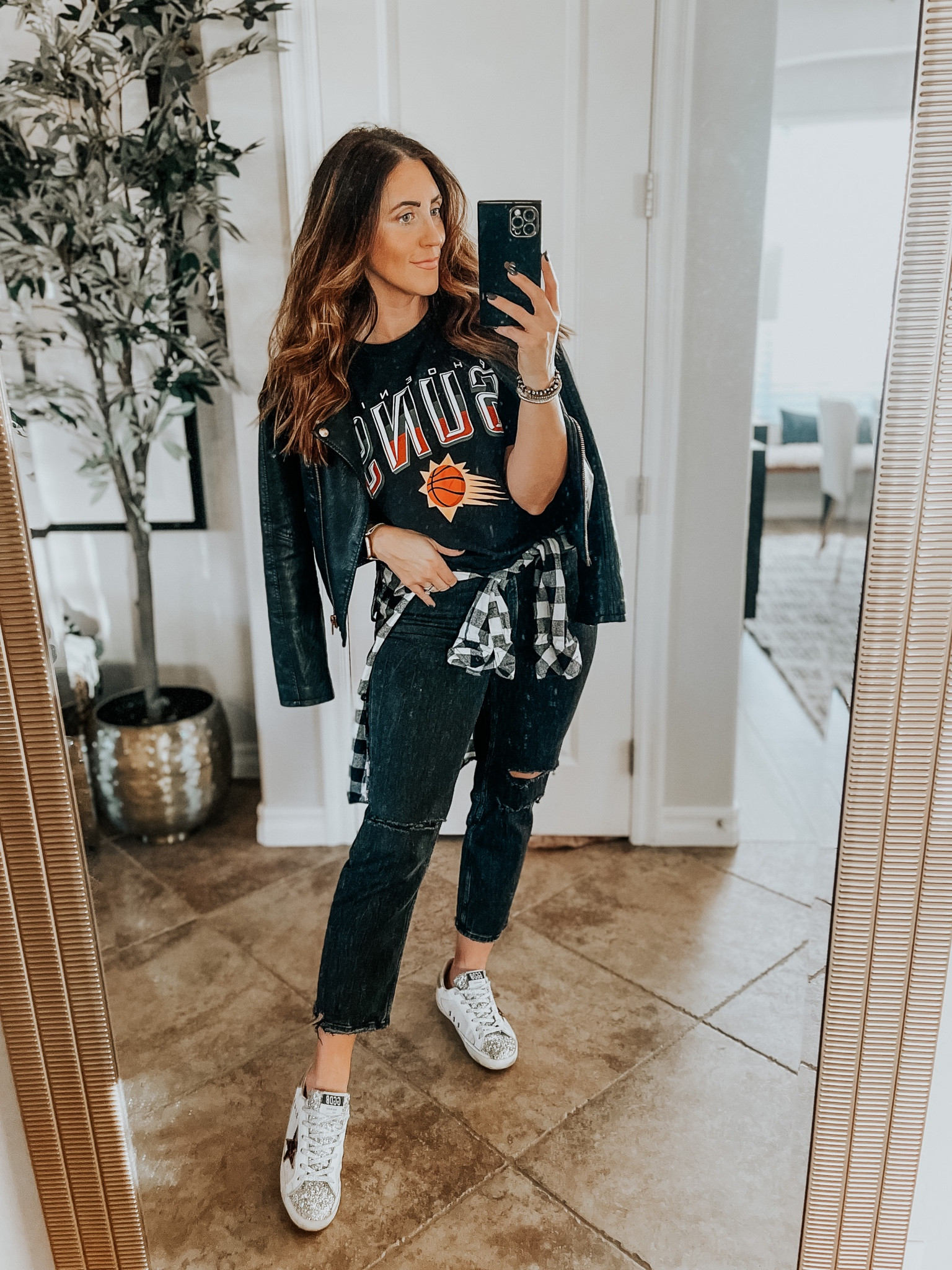 Suns game outfit 🏀☄️💥 NBA game outfit idea // cut off tee (men’s medium) plaid flannel, faux leather jacket, straight ankle jeans (27 short) sneakers / golden goose // street style 

#LTKunder100 #LTKsalealert #LTKunder50