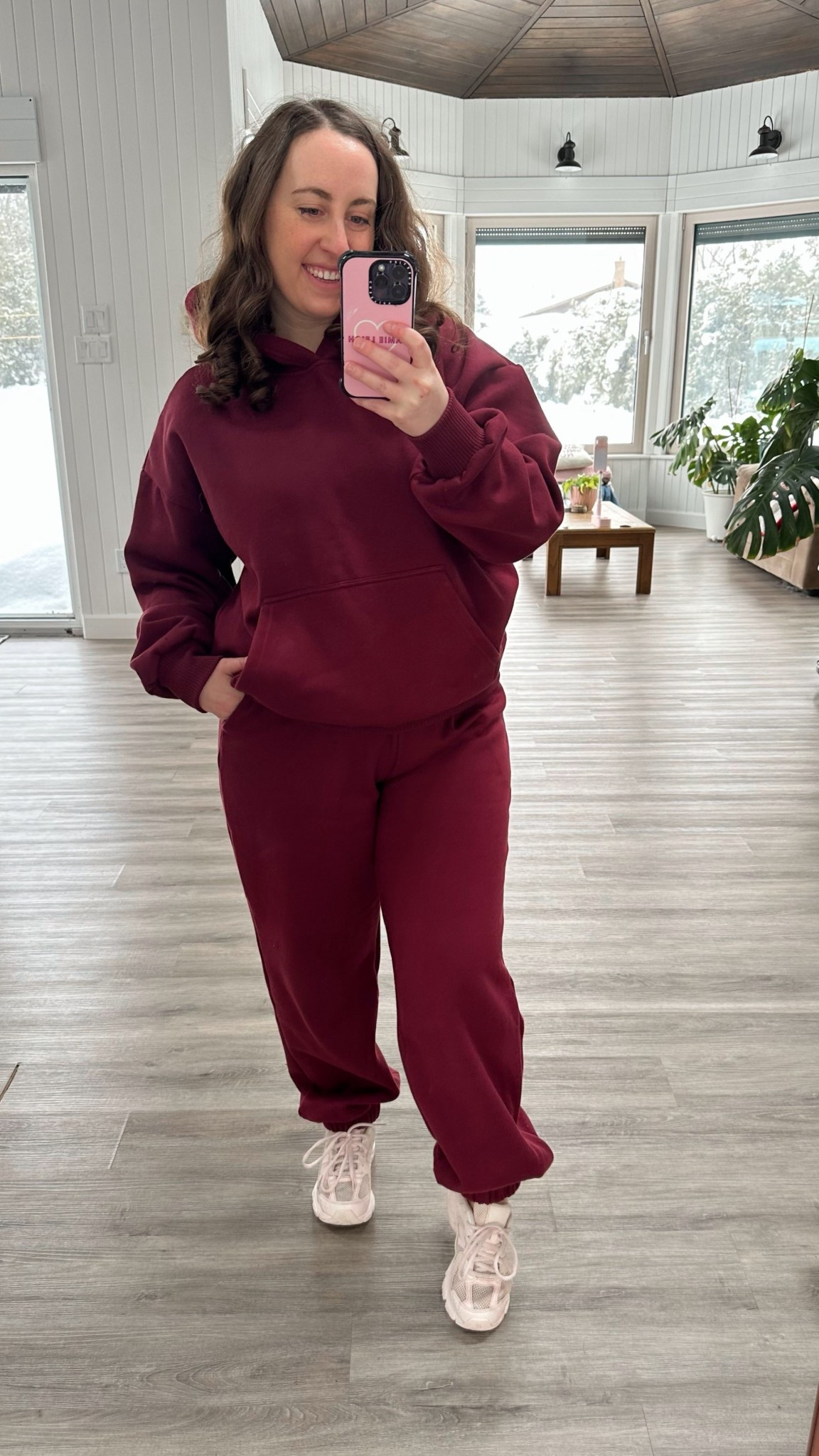 The comfiest sweatsuit I have tried in a long time! I love this deep burgundy colour and this set was so well made. It is super thick, has zipper pockets on both the bottoms and in the kangaroo pocket on the top, and is a cozy fleece on the inside. Such an adorable set! 

#LTKMidsize #LTKActive #LTKootd