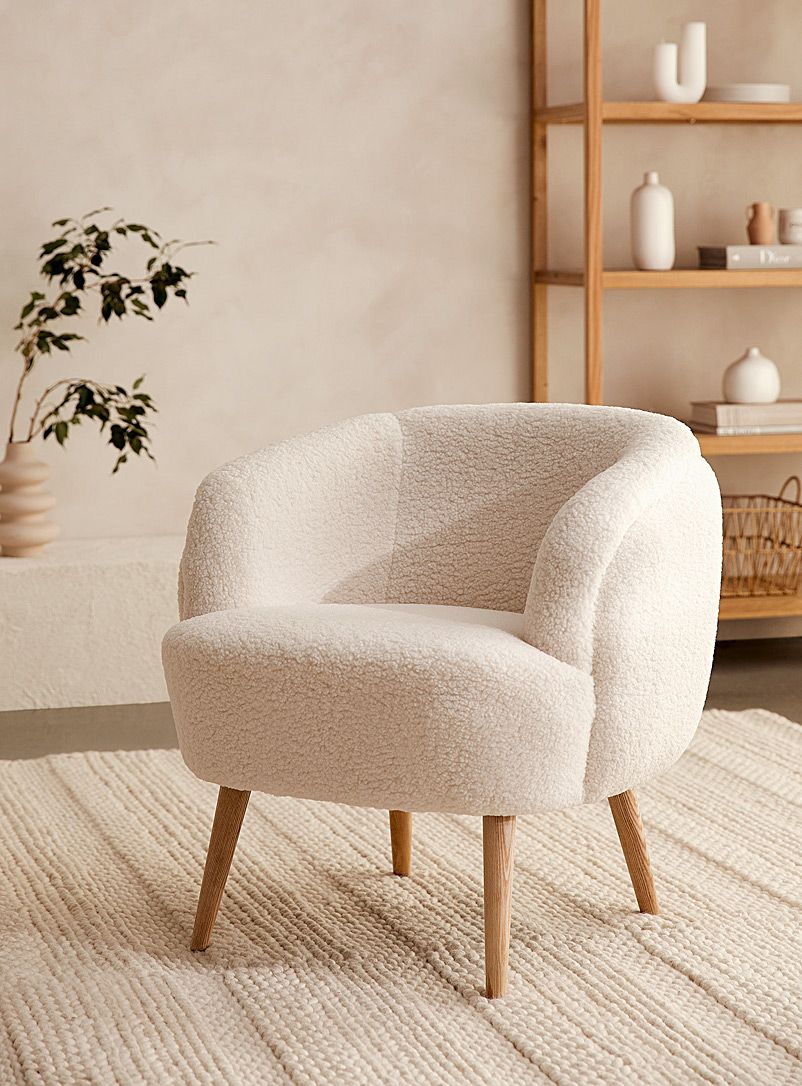 Curved wood and sherpa lounge chair | Simons