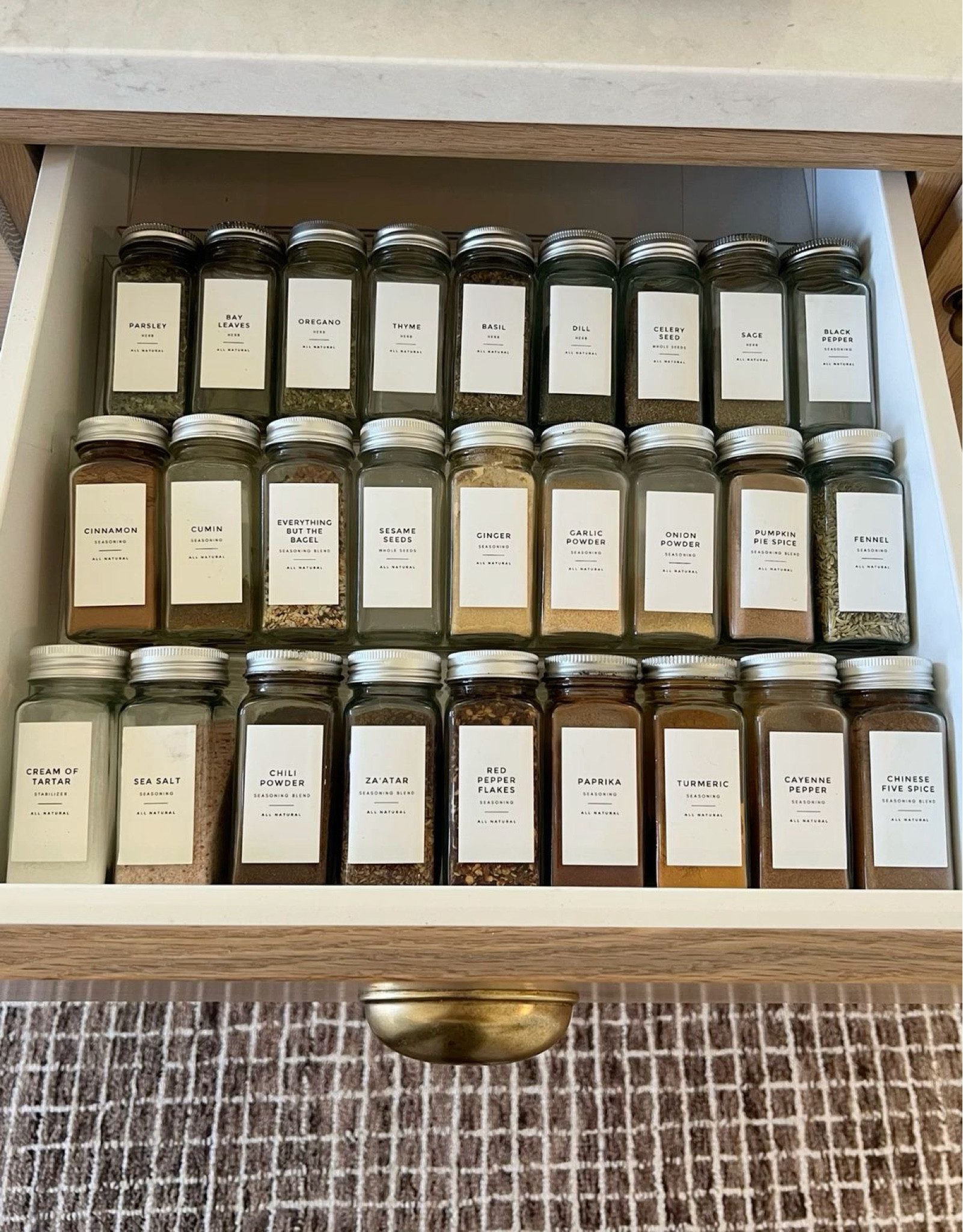 The best kitchen spice drawer organization!
My favorite way to organize spices. These glass jars, waterproof labels, and acrylic spice tray/ drawer organizer are all super affordable and 100% worth it!
Organization, home organization, kitchen organization, aesthetic, aesthetic organization, spice drawer, glass jars, label organization

#LTKSaleAlert #LTKHome #LTKFindsUnder50