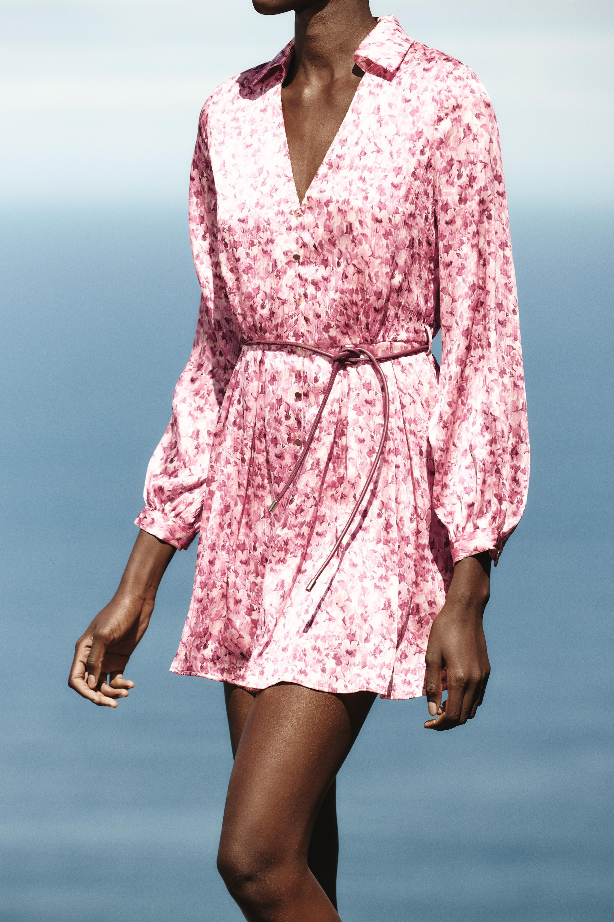 Round neck, v-neck, long sleeve dress. Featuring a drawstring waist, faux front buttons, lining a... | Zara UK