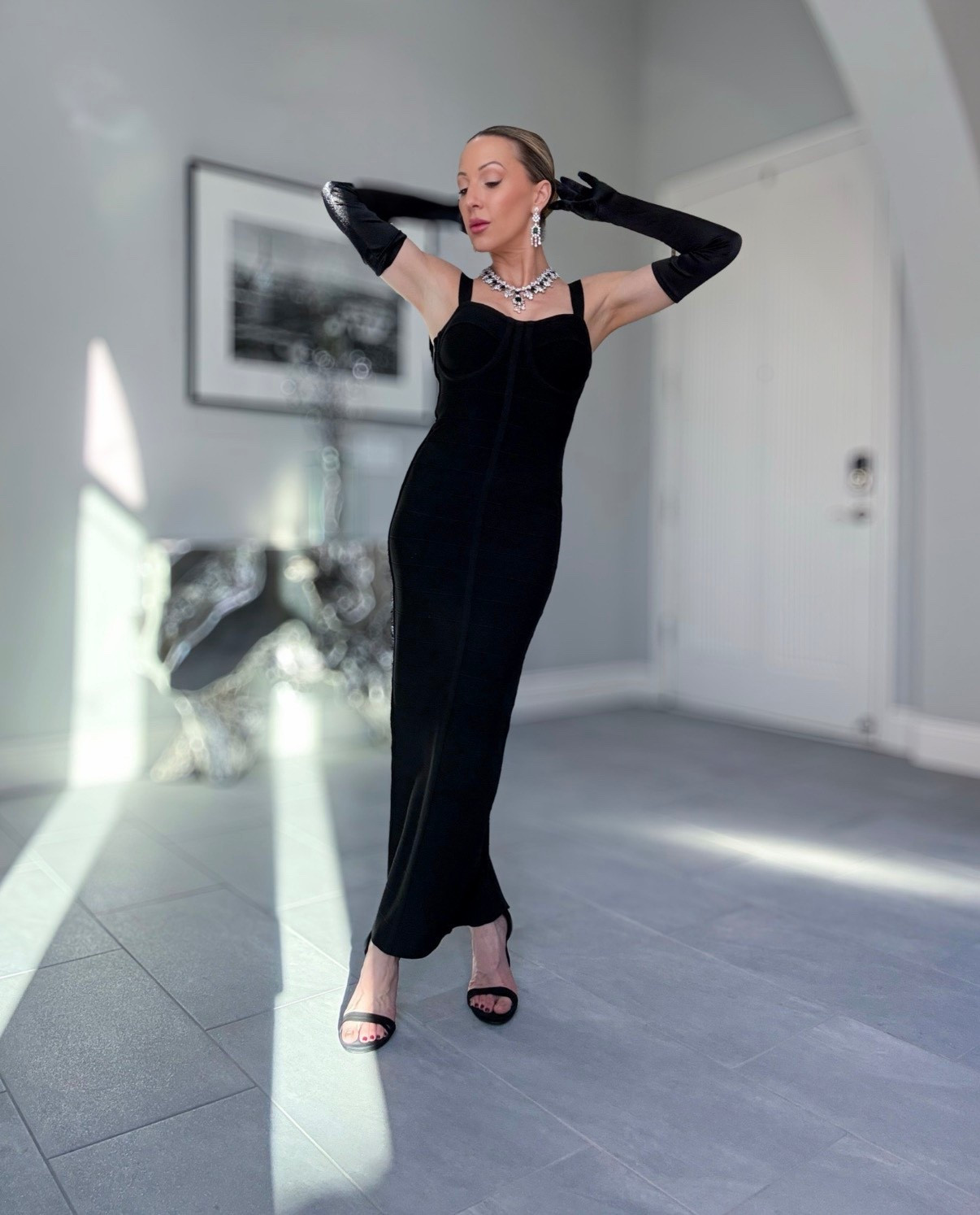 Check out these cyber Monday sale finds: Christmas party dresses / holiday party dresses on sale from Revolve. Holiday party dress, holiday outfit, Christmas party dress, black tie dress, gala dress, black bandage dress runs true to size styled with black suede strappy heel sandals and long black gloves. #ltkparties

#LTKParties #LTKStyleTip

#LTKCyberWeek #LTKootd #LTKSaleAlert