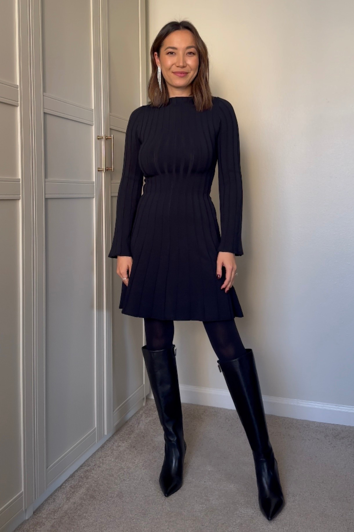 Minimal + chic holiday dress 

Sweater dress — 40% off at Jcrew 
Tights — linked to similar ons on Amazon 
Stuart Weizmann boots — old, linked to similar styles on sale at Nordstrom 

#LTKCyberWeek #LTKSaleAlert