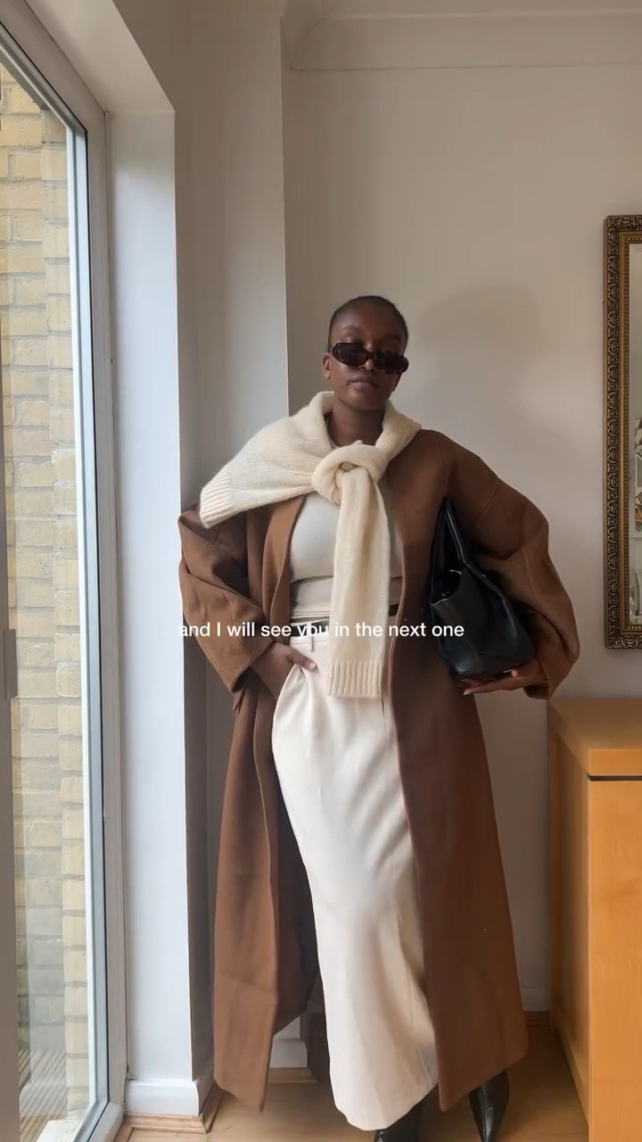day 22/30🤎✨ and the category is HANDLED! There’s something about a wool coat that makes me feel like I need to wear nothing but beige, get a silk press and drink out of giant wine glasses ….basically just cosplay as Olivia Pope! 🙂‍↕️

coat @asos | ad - it’s currently OOS but I’ve linked alternatives on LTK! 
skirt @frenchconnection 
top @arketofficial 
jumper @sezane 
bag @demellierlondon 
rings @oreliajewellery + @mejuri 

*includes gifted products 
•
•
•
•
•
wool coat, winter coat, styling coats, oversized coat , pencil skirt, maxi skirt, knee high boots, styling skirts, kitten heels, styling reel, minimal outfit #modestoutfitideas fashion inspiration, Pinterest, daily wear, daily outfit, styling, outfit of the day
#ootd #fallfashion #autumnstyle #fallstyle #modestoutfitideas #stylingreel #fashionreels #effortlesschic #fashiontrends #falltrends #capsulewardrobe #capsulecloset #fashionhacks #minimalstyle #pencilskirt #woolcapt #frenchconnection #coat #wintercoat