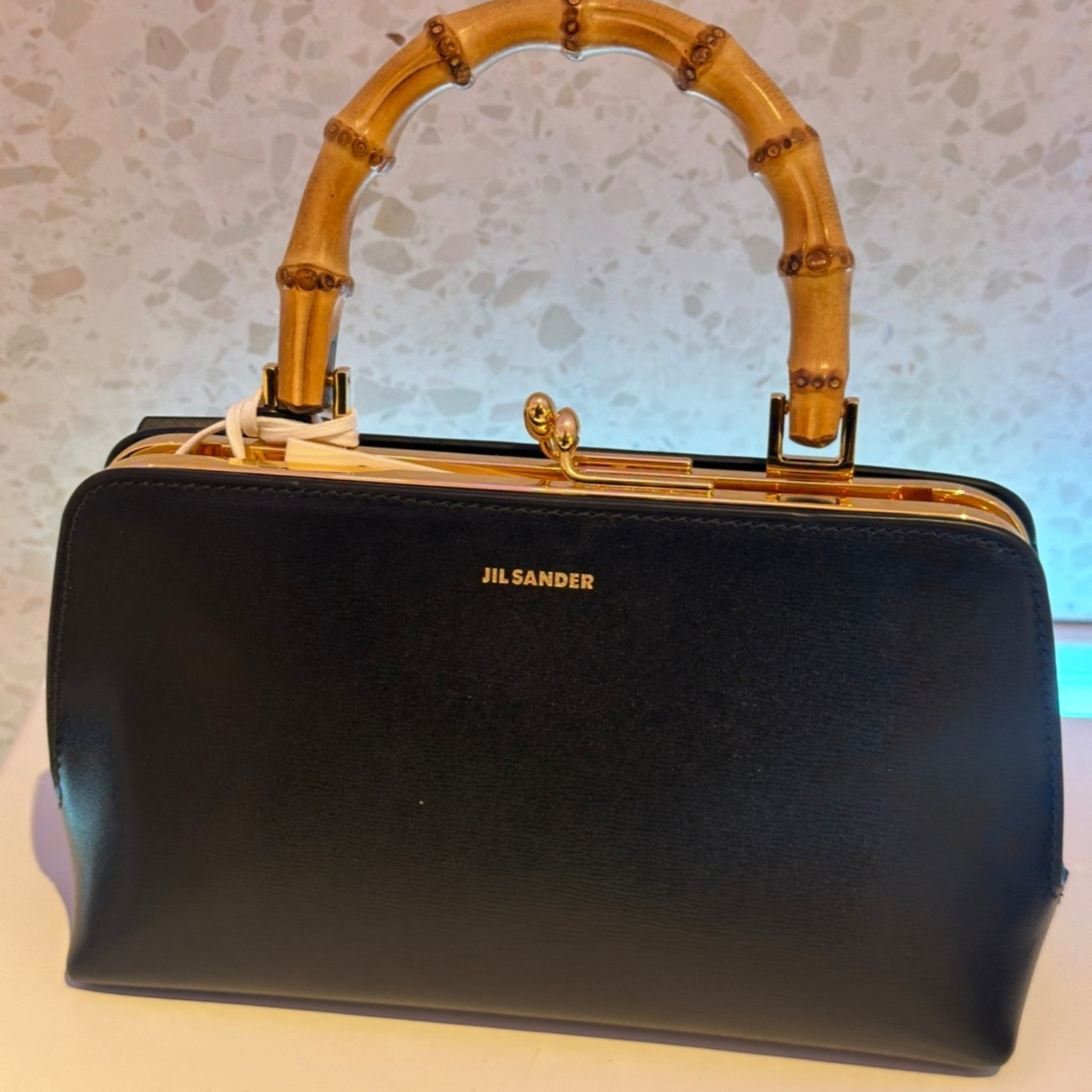 Jill Sander bags are minimalistic beauties. This one was spotted while window shopping at Printemps in Manhattan.