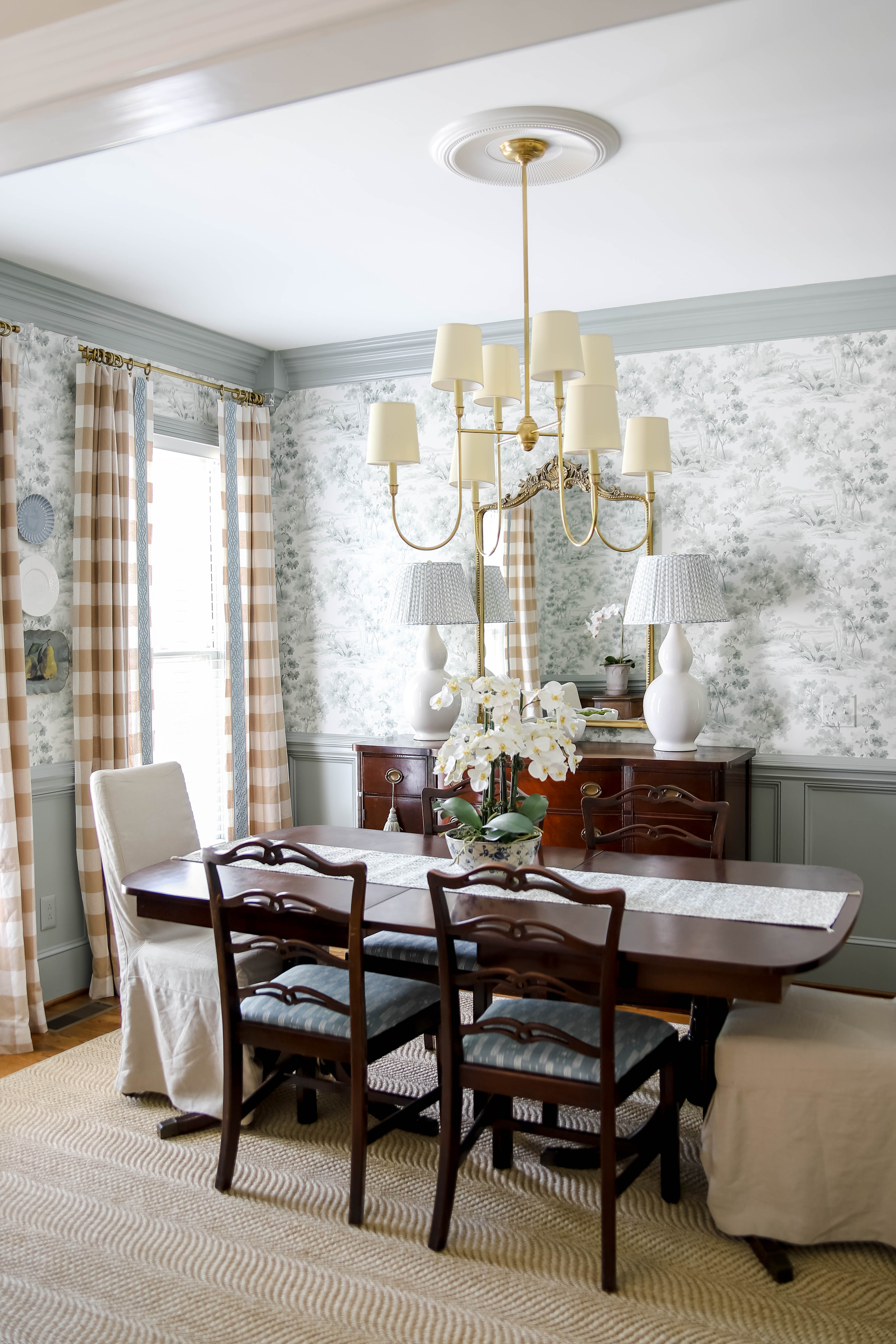 I can't believe it's been 5 years since I started this room makeover. Yes, it may have taken me more than a year to finish it, but goodness, I love it still as much today as the day I finished it! Love my traditional dining room with my great-grandmother's furniture! 

 #LTKHome