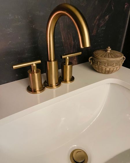 The perfect gold modern clean lined bathroom faucet fixture. 

#LTKhome #LTKstyletip #LTKfindsunder100