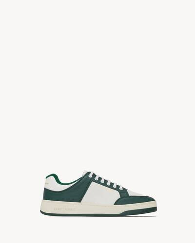 Low-top laced sneakers featuring perforated leather on the front panel, a gold-tone Saint Laurent... | Saint Laurent Inc. (Global)
