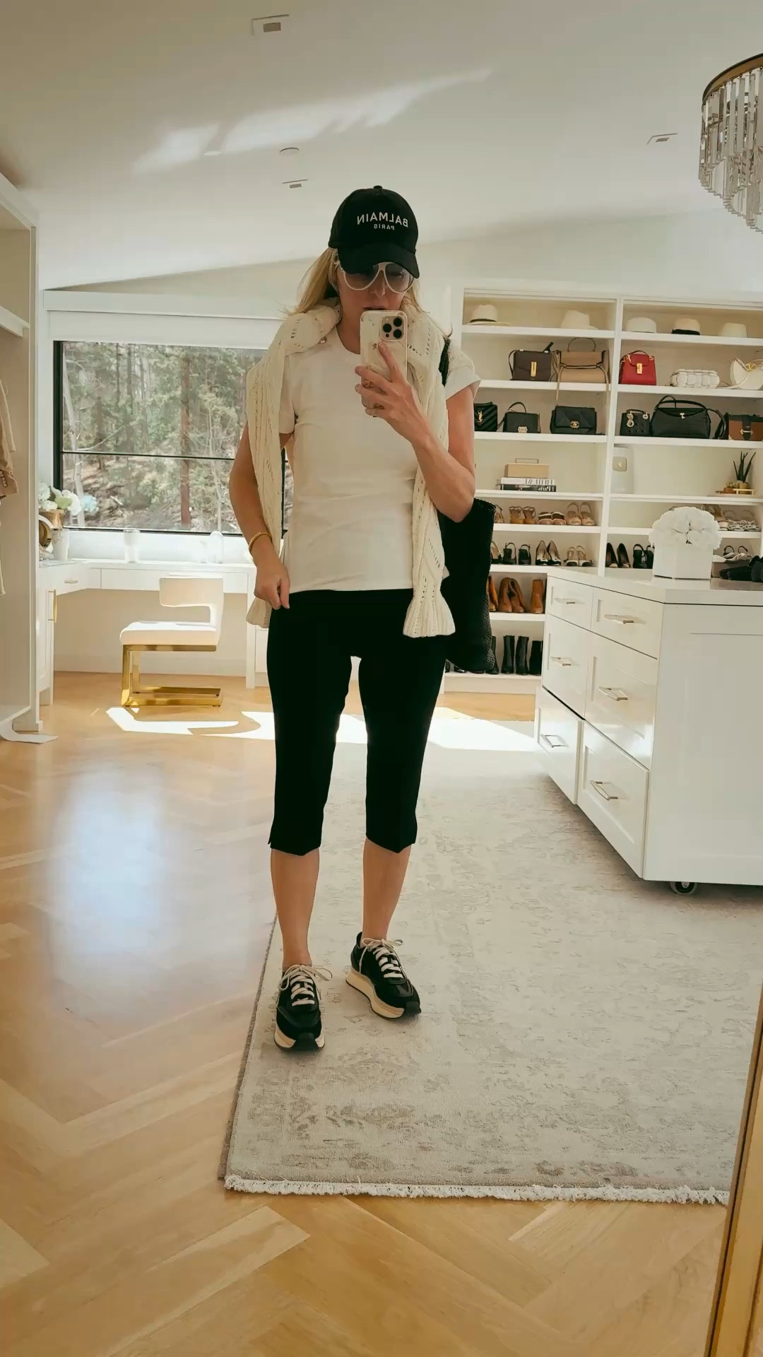 Cute casual lax mom sideline outfit for a warm day. ☀️ This is by far my new favorite white tee with luxe gold buttons at the shoulders and ruching at the waist. It’s flattering and elevated - not-so-basic white tee. 

The tote will hold everything and is so light too!

#LTKmomlife #LTKootd #LTKOver40
