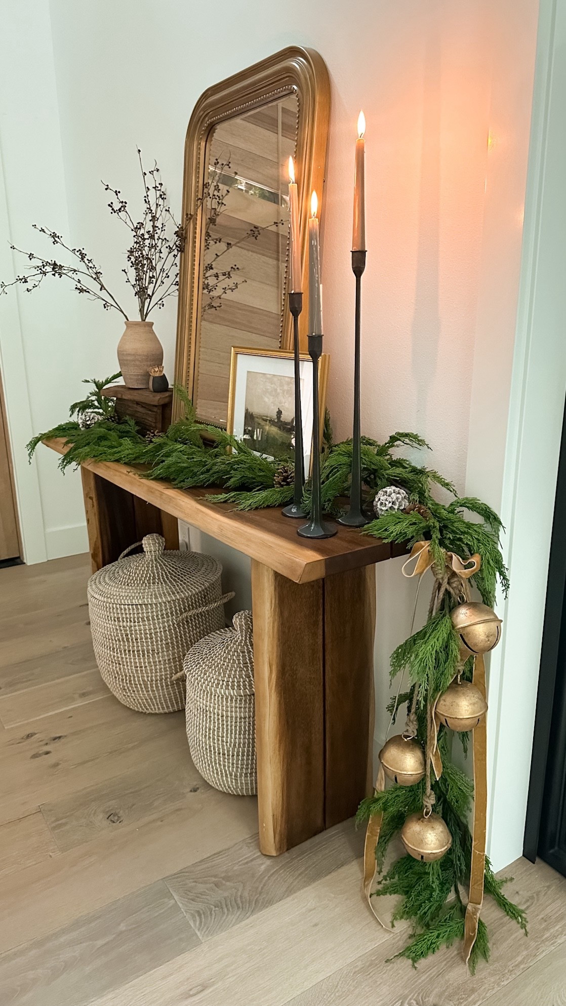 Holiday entryway with @wayfair mirror, garland, bells, candle stick - it’s the perfect mix of function and festive!
#ad #Wayfair #WayfairPartner
