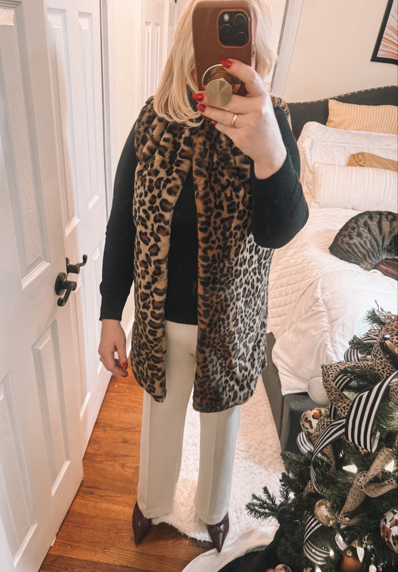 I live for a great statement vest or coat.
Leopard print, just adds to the fabulousness.
Worn with dress pants like here, this is a great work outfit. If I swap out the tailored pants for jeans, this is great for weekend brunch, errands and coffee runs .

#LTKSeasonal #LTKWorkwear #LTKFindsUnder100