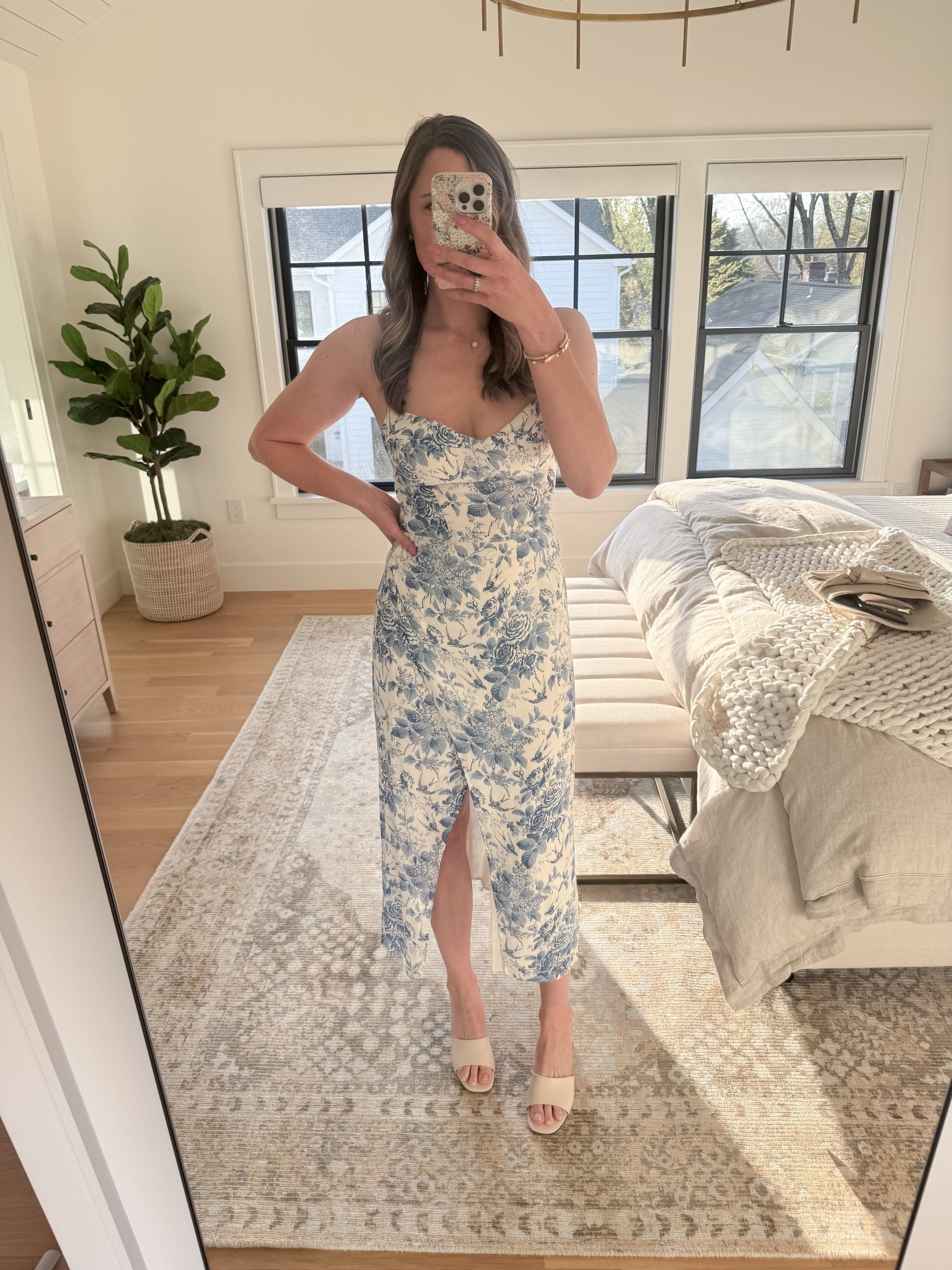 This blue and white floral dress from reformation is so chic and comfortable. This is perfect for a spring or summer wedding. I wore it last weekend to a retirement party for one of our friends and I got so many compliments on it! Size up if in between sizes. This is a size 6.

#LTKHome #LTKStyleTip #LTKOver40