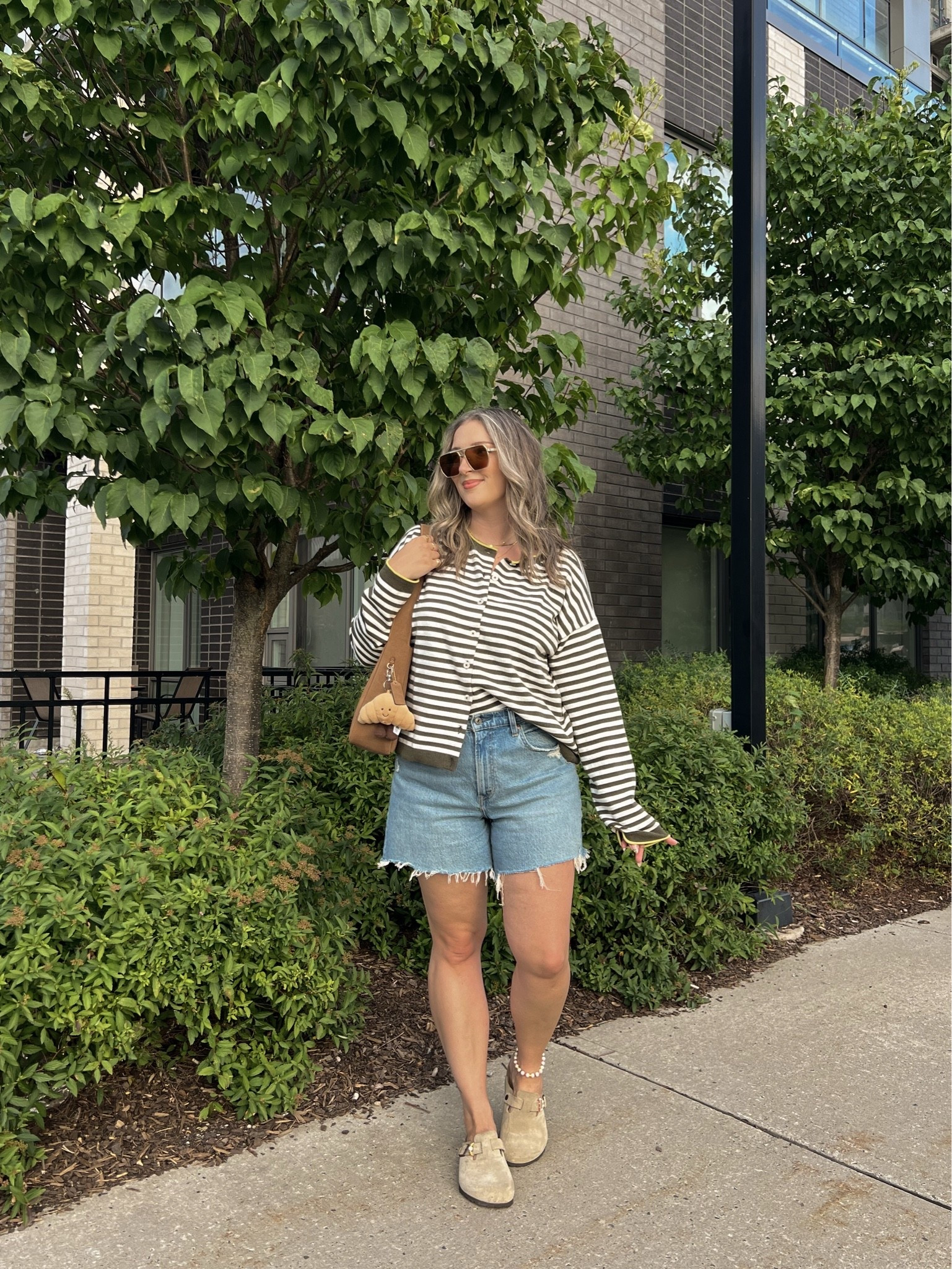 Early fall outfit! Wearing M in the striped cardigan. Sized up to 32 in the denim shorts for a baggy fit. I’m a 9.5-10 shoe and wear a 10 in the Birkenstock clogs

#LTKsale #LTKfall #LTKmidsize