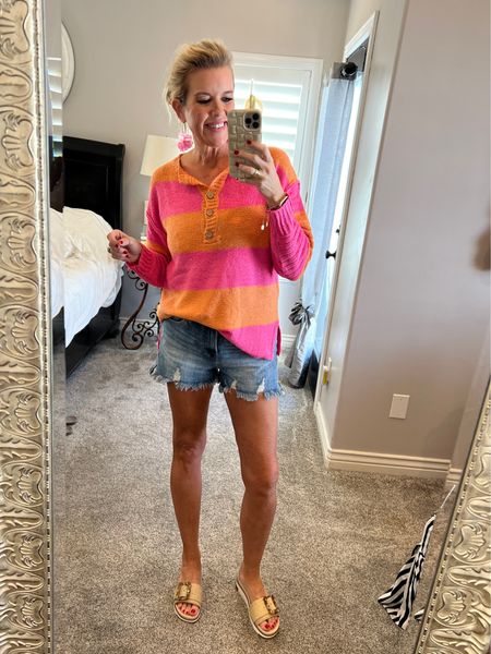 Outfit inspiration ✔️

Social threads best sellers

Best selling light weight orange and pink stripe sweater , fits tts

Best seller -Risen shorts, affordable and fit tts perfect for summer and easy to wear and style 
Great over a swim suit as well✔️

Sam Edelman raffia/bucket  sandal slide

Flower earrings accessories converge 

Perfect summer outfit/pieces you’ll wear on repeat 

#LTKStyleTip #LTKFindsUnder100 #LTKTravel