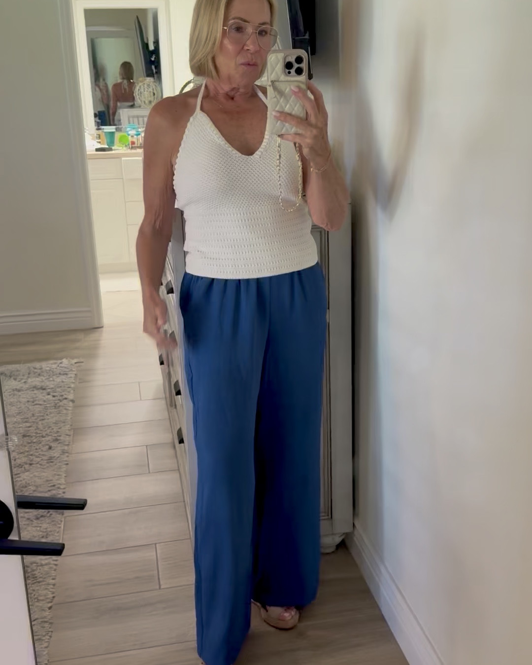 These halter tops are so cute and versatile and on Sale even my wedge sandals.

#LTKOver40 #LTKootd #LTKSeasonal
