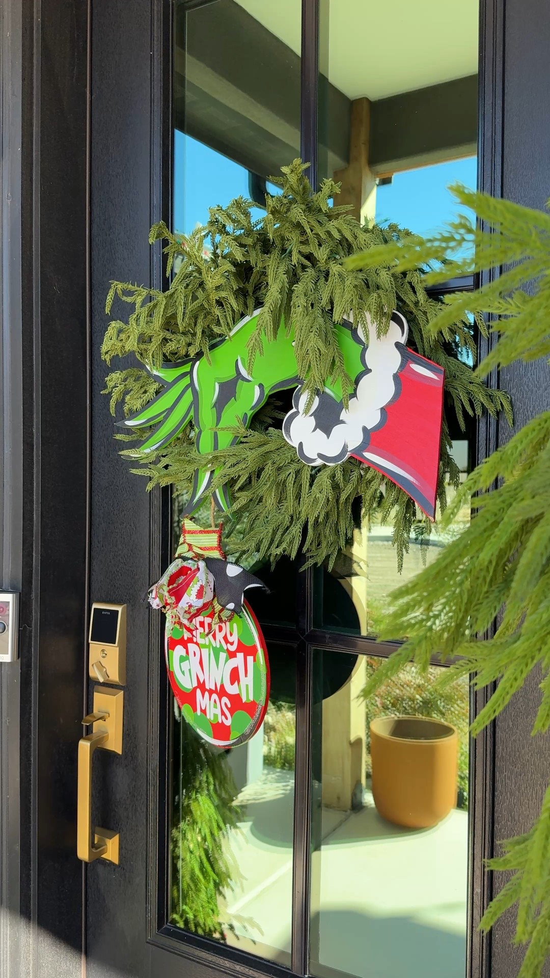This one’s a cool Norfolk pine wreath looks so good with my hand painted grinch door hanger!! 

#LTKHoliday #LTKCyberWeek #LTKHome