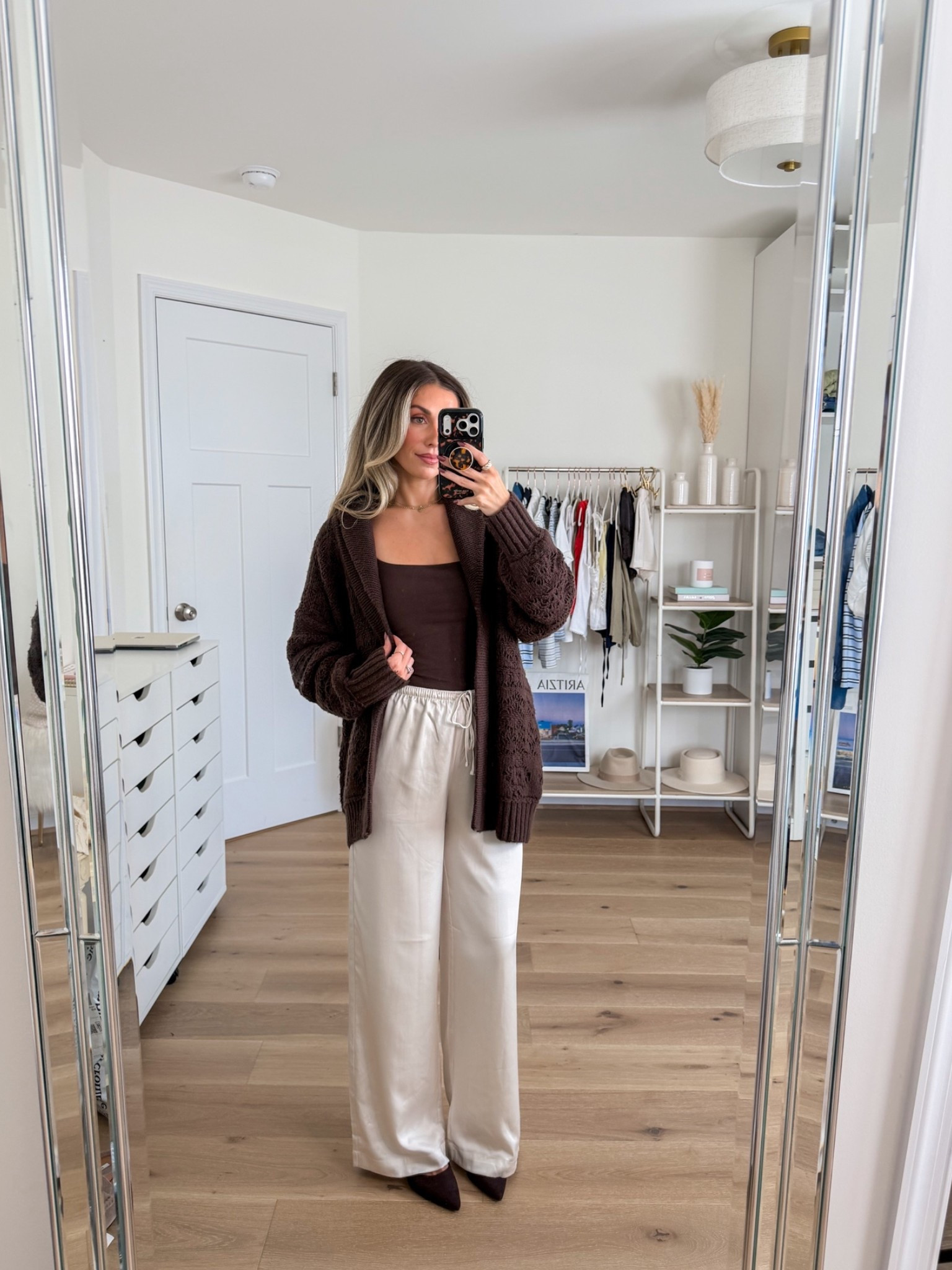 Elevated casual fall outfit and another way to style the satin pants! Size small in the cardigan
Size xs in the tank top
Size xxs regular in the satin pants — I’m 5’2 for reference and prefer this length

#LTKootd #LTKWorkwear #LTKPetite
