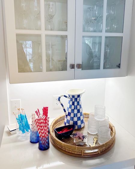 Our dry bar set up for Memorial Day! The blue and white check pitcher is MacKenzie Childs!💙 Paper straws are Amazon! 