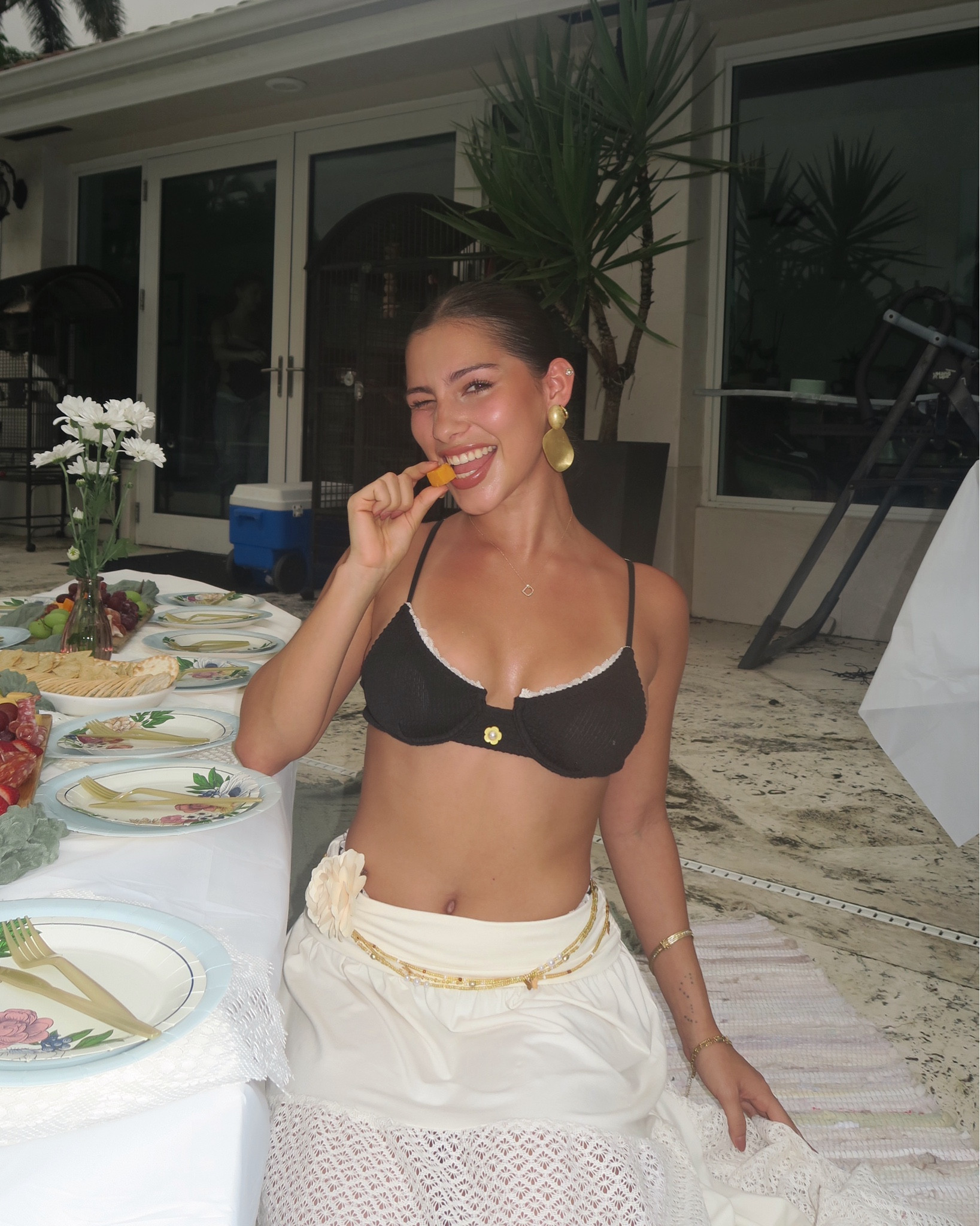 A black bikini but with some extra detail that takes it to the next level! Wearing size  XS

Gold statement earrings and the waist beads make the outfit fun!

#LTKSeasonal #LTKSwim