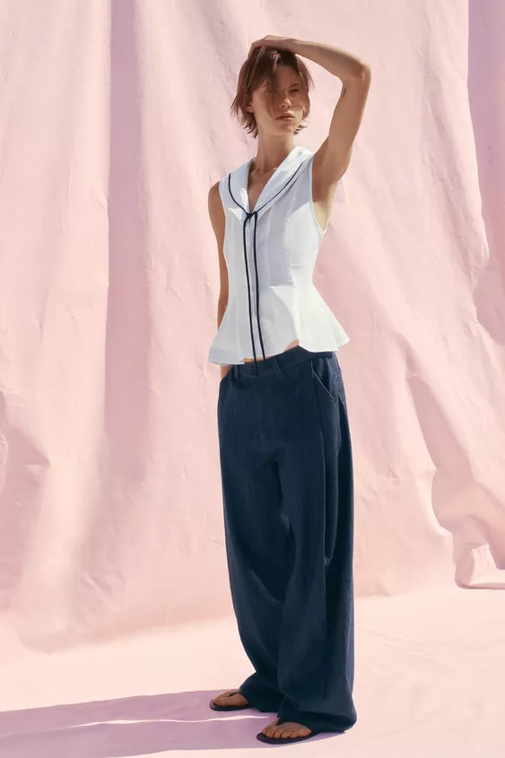 An enhanced experience.Check it out in the app. | Zara US