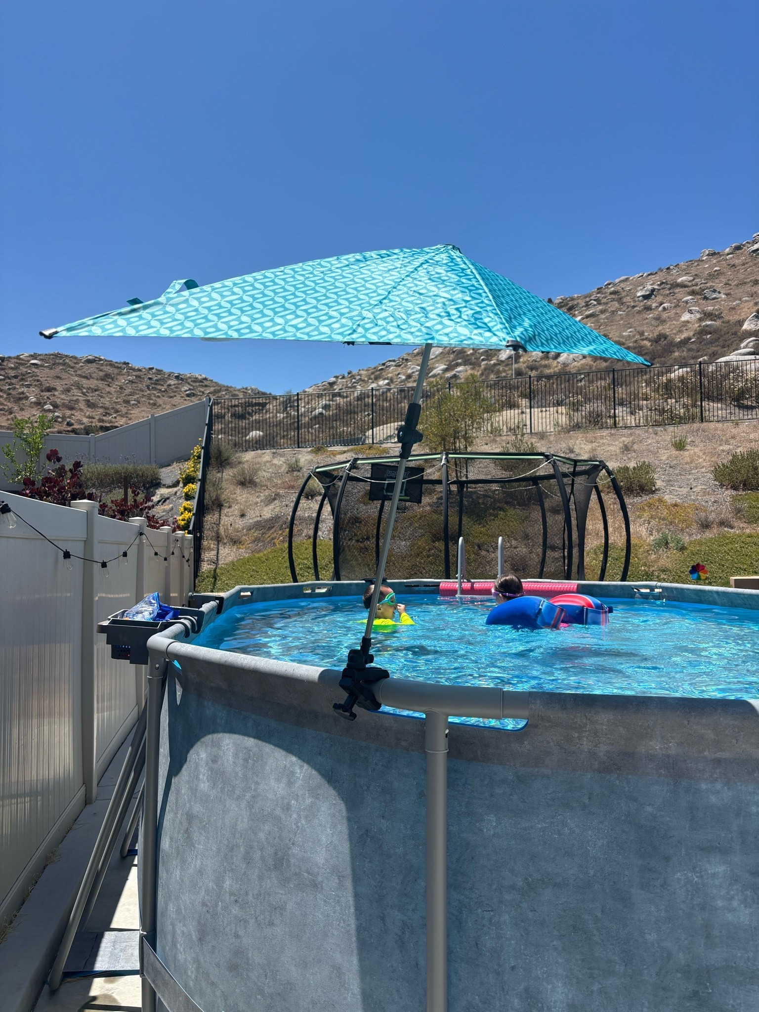 I got this for my stroller, but it works great for standing next to the pool while the kids splash and play. ￼

#LTKHome #LTKSwim #LTKmomlife