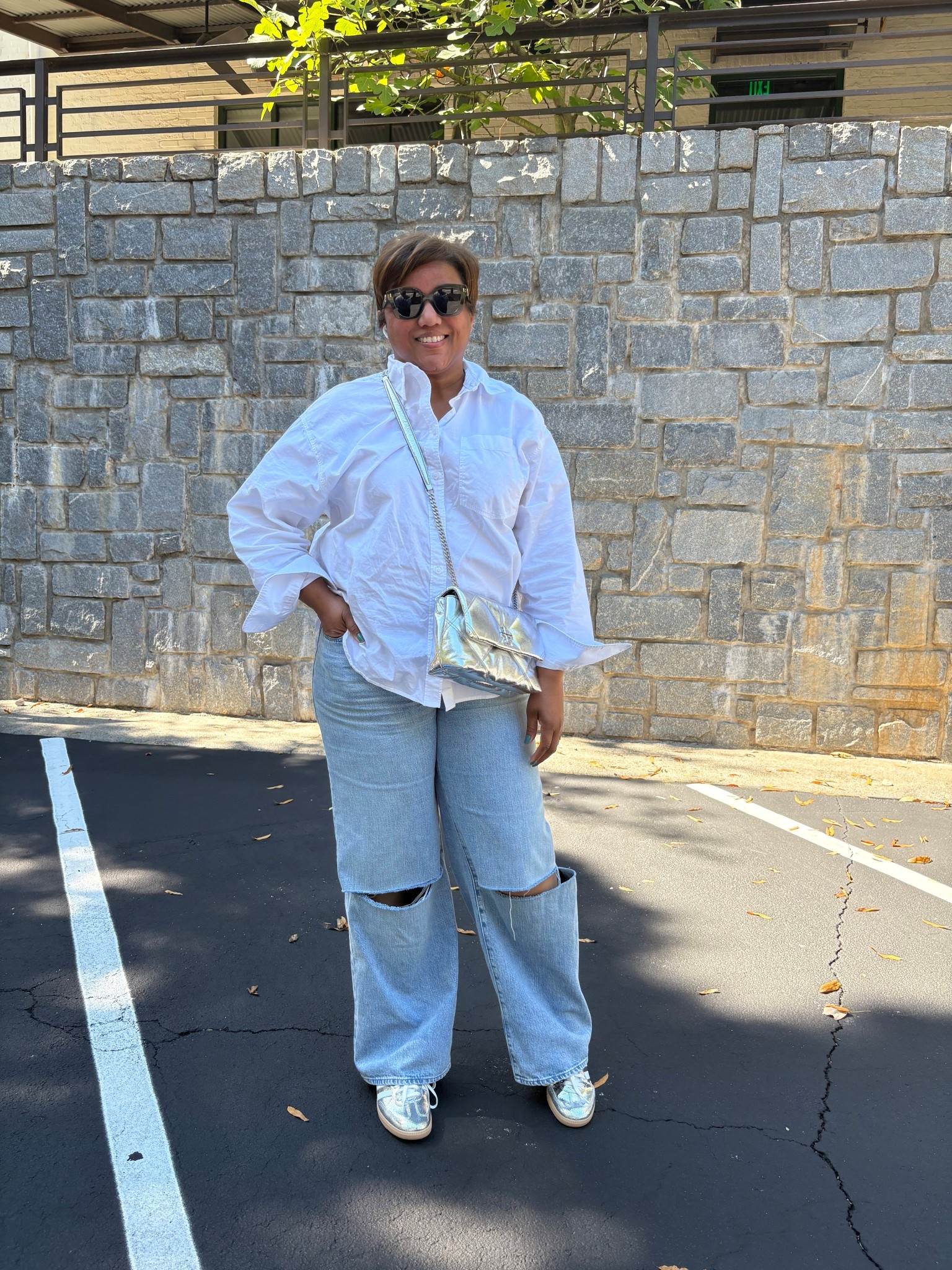 OOTD:  I LOVE an oversized white shirt SO much!  I sized down from an XL to a Large in this shirt. The shirt is offered in a variety of solid colors and patterns, too! 

#LTKOver40 #LTKPlusSize