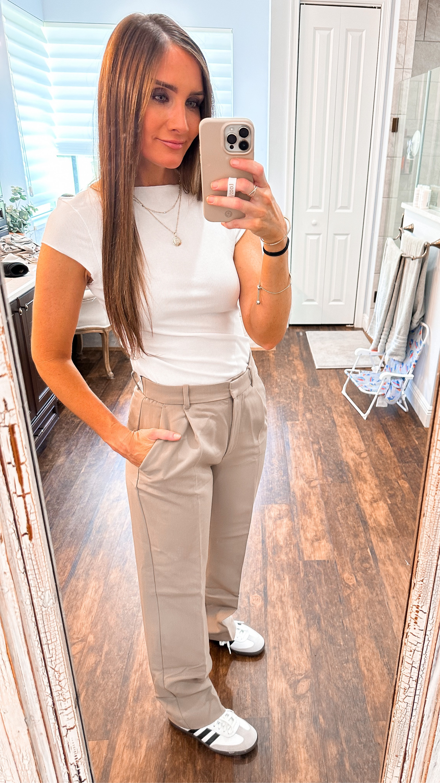 How to style Samba OG sneakers, trouser pants, tan trousers, white tee

#LTKFind #LTKunder100 #LTKstyletip