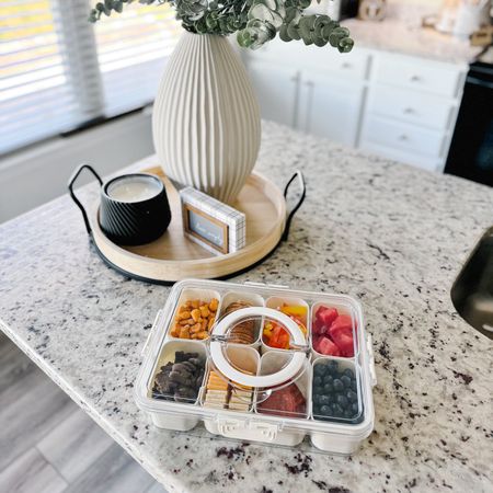 This handy snack tray will definitely be with us at the pool this summer! I love how compact it is, so it can easily sit at the bottom of my pool bag without taking up precious space. And with individual compartments, everyone can have their favorite pool snack. It locks in place, keeping everything secure.

#LTKSwim #LTKFindsUnder50 #LTKHome