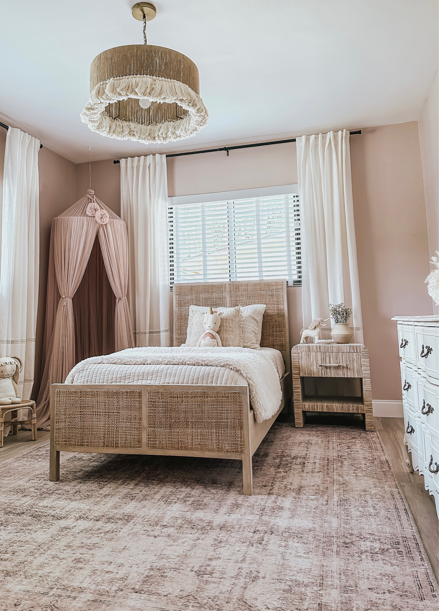 Girls bedroom #toddlerbedroom #kidsroom #kidsroominspo #girlsroom #girlsroominspo #canebed #curtains #blushrug #vintagerug #tasslechandelier #girlsbedroom 

#LTKfamily #LTKhome #LTKunder50