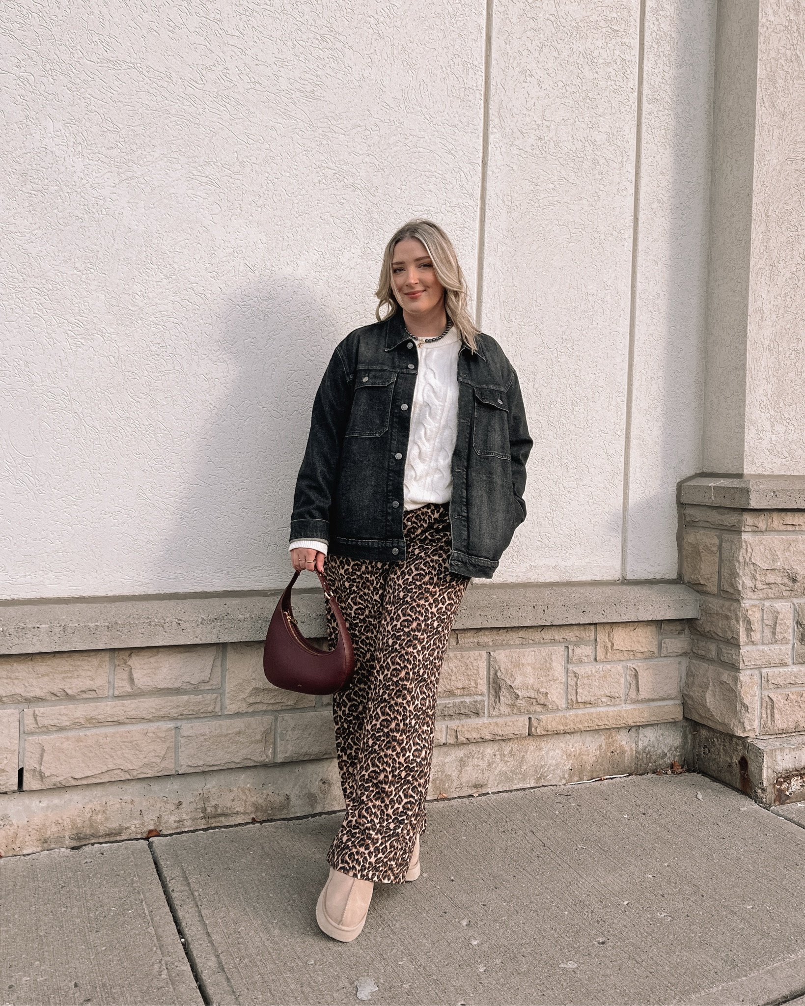 Comfy outfit on sale! My leopard print pants are 45% off and cable knit sweater is 50% off! Wearing my usual size L in both. My black denim jacket is from the Walmart men’s section, wearing XL. Ugg tazz fit TTS. Burgundy shoulder bag is an Amazon find!

#LTKsale #LTKwinter #LTKmidsize