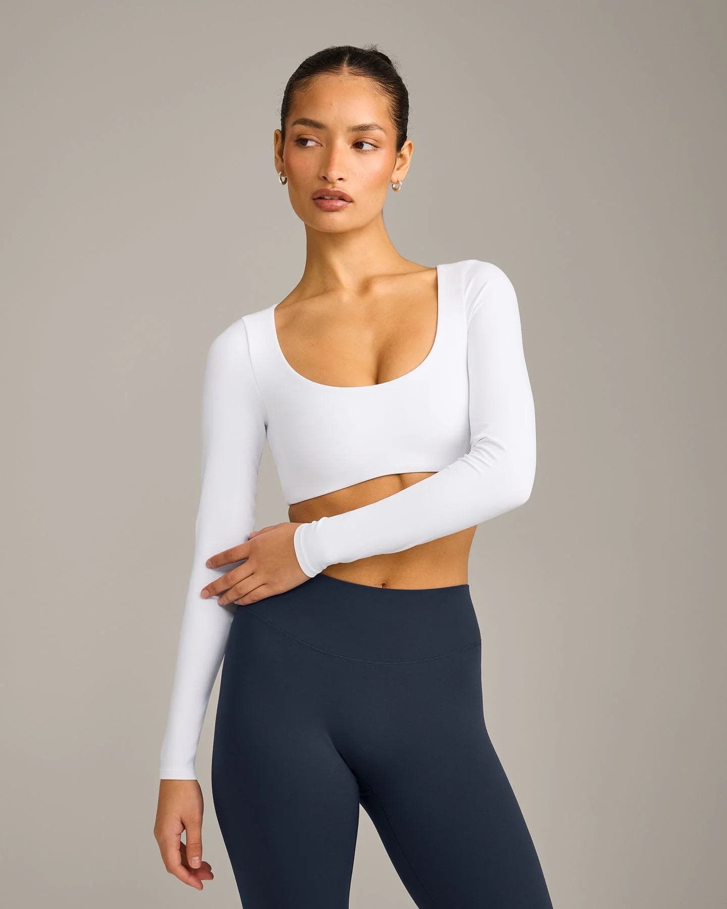 SoftMotion\u2122 Scoop Neck Long Sleeve Crop Top with Built in Bra Shelf with Gray Logo
White | Oner Active (UK / US)