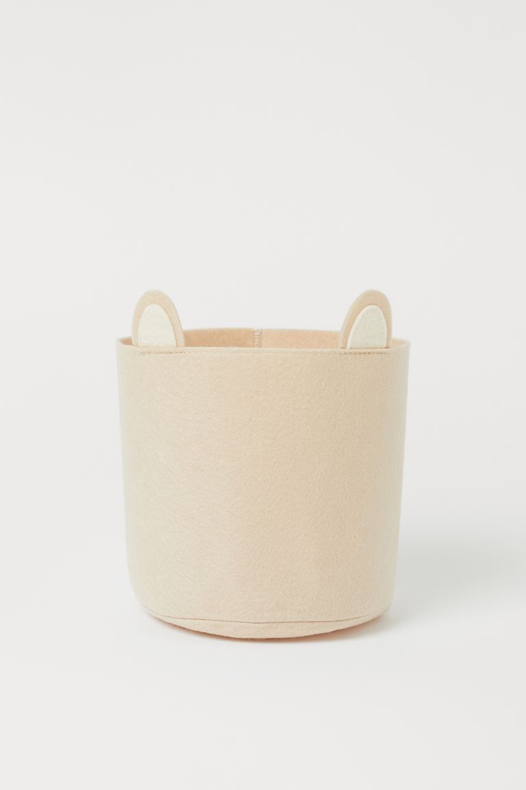 Small storage basket in felted fabric with ear-shaped appliqués at top. Diameter approx. 6 in. H... | H&M (US + CA)