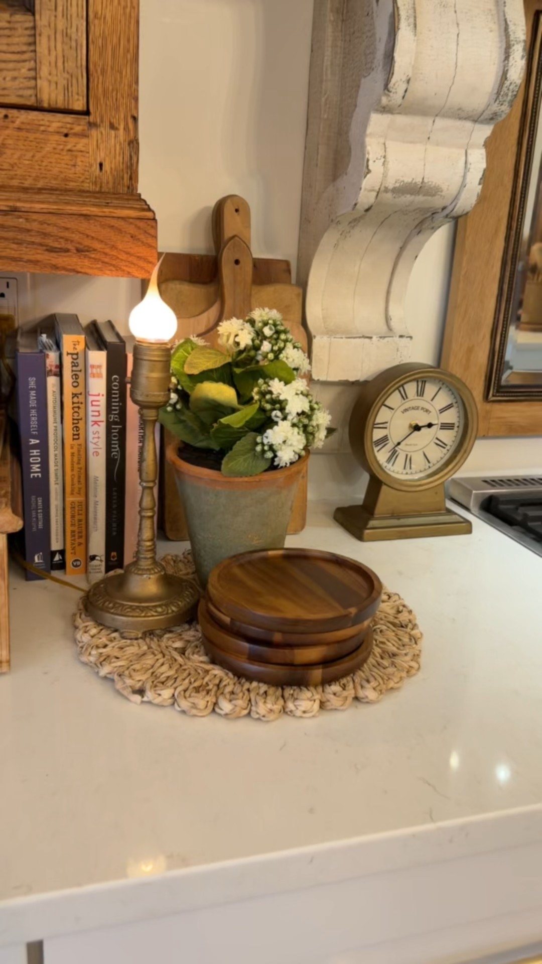 I love this little home decor setup in our kitchen. I recently added this set of wooden plates. They act as decor but you can also use them for a quick snack plate! 

#LTKSeasonal #LTKstorytime #LTKHome