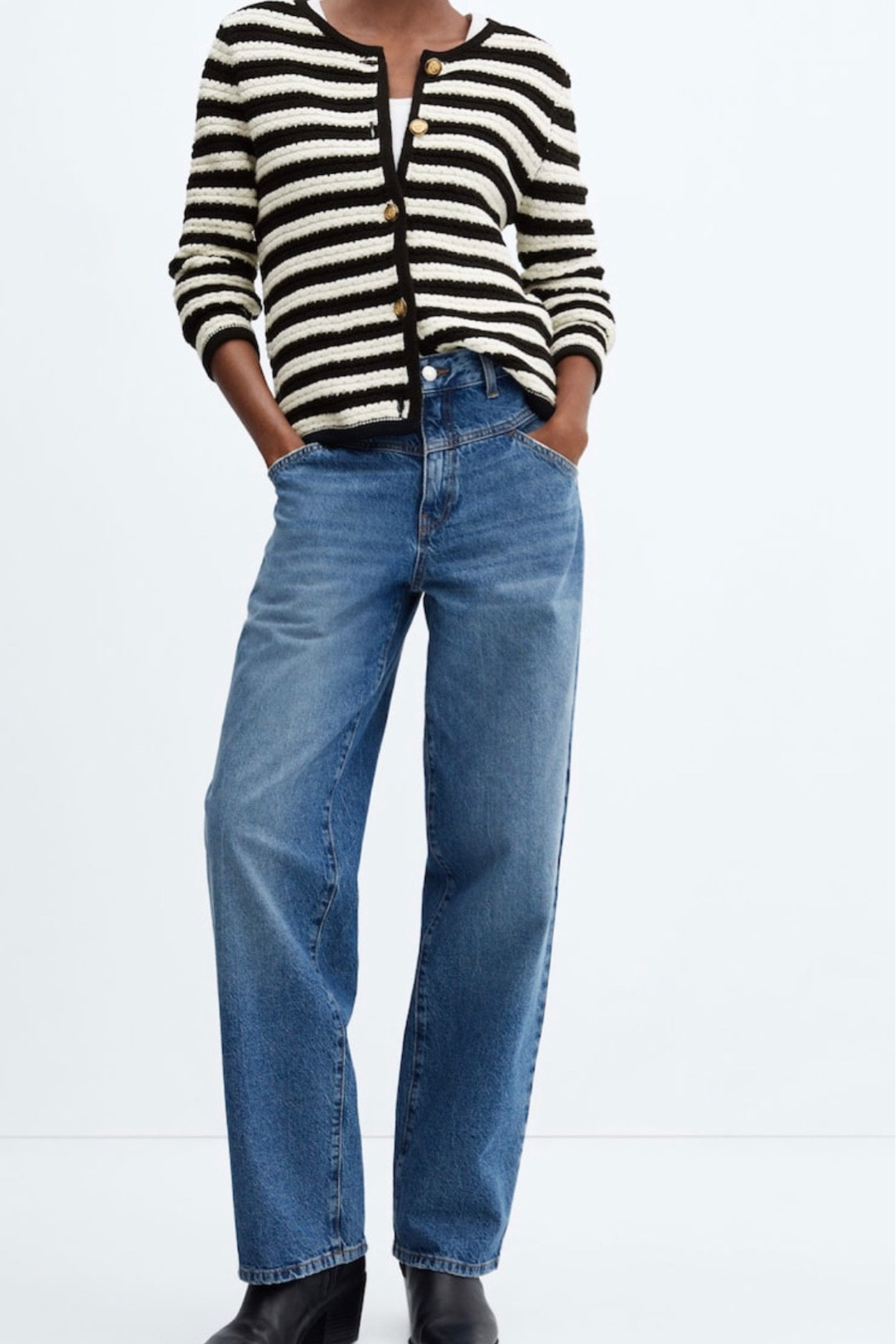 Mango knitted boucle jacket with straight blue jeans and cowboy boots