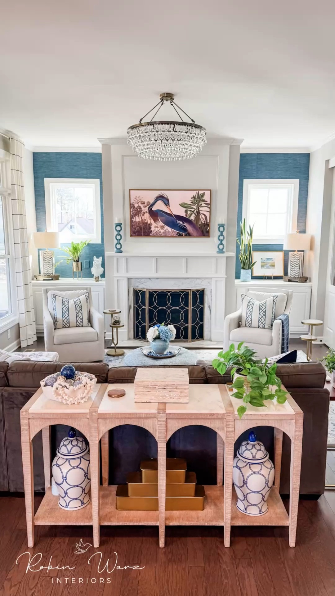 Hey Lovelies ✨ this living room is bringing me so much joy right now!!

My Coastal Grandmillennial space just got a fresh little glow-up with new Heron TV art on my Samsung Frame TV (tell me that blue and white moment isn’t EVERYTHING 😍). It literally looks like real art…no more big black box!

And can we talk about these swivel chairs?! Such a good Amazon look-for-less find—classic, stylish, and actually comfortable (we love that for us 😉).

Proof that you don’t need to spend a fortune to create a collected, designer look. Mix high + low, keep it cohesive, and you’re golden.