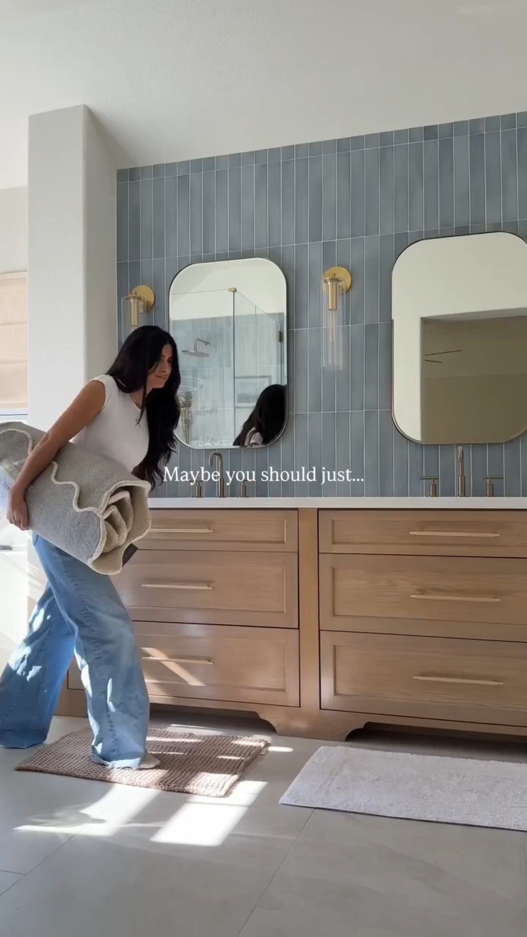 Get rid of the bathmats and add a runner 🤷🏻‍♀️
Functional, high-end, and ohh soo cozy. #bathroomstlying #designtip

#LTKHome