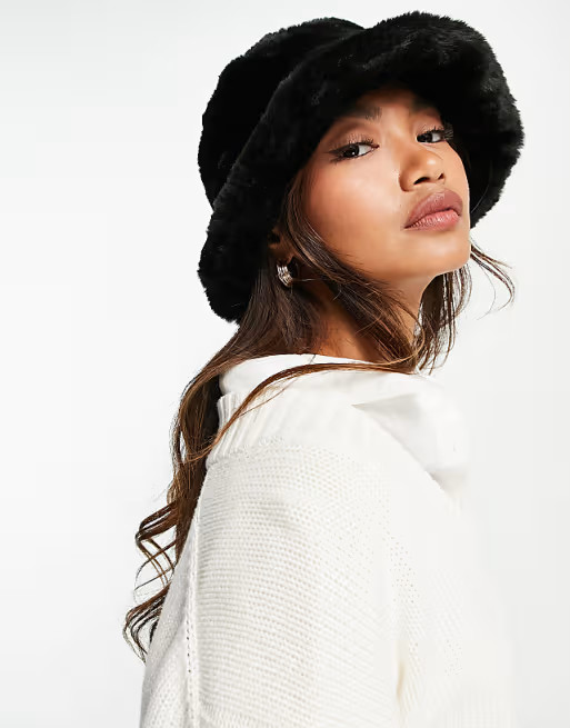 ASOS DESIGN faux fur roll back bucket hat in black | ASOS | ASOS (Global)