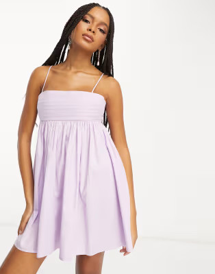 ASOS DESIGN cotton pleat bust babydoll mini sundress in lilac | ASOS (Global)