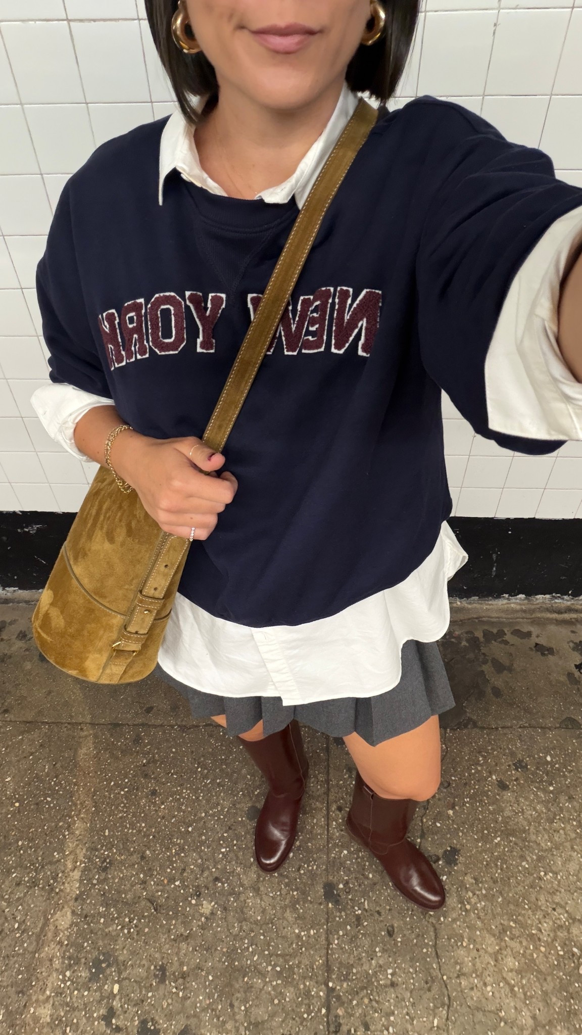 Pleated mini skirt and a button down with a sweatshirt. Sezane fall outfit 

#LTKStyleTip #LTKFindsUnder100 #LTKItBag