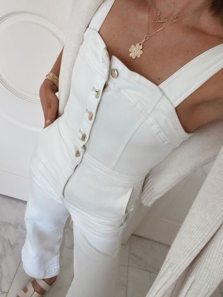 The perfect white jumpsuit for summer. A great outfit for an outdoor concert! #summeroutfit #jumpsuit

#LTKSeasonal