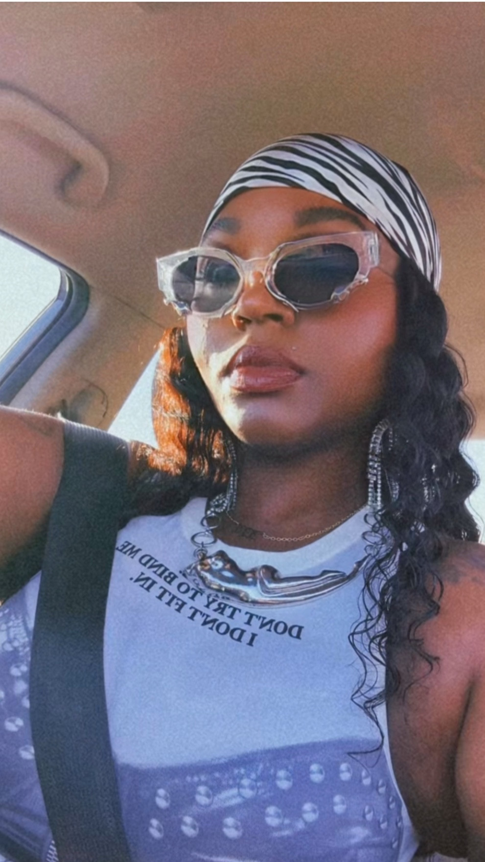 Graphic tee moods: 
Don’t try to bend me, I don’t fit in 😎 #shein 

#LTKWatchNow #LTKStyleTip #LTKFindsUnder50