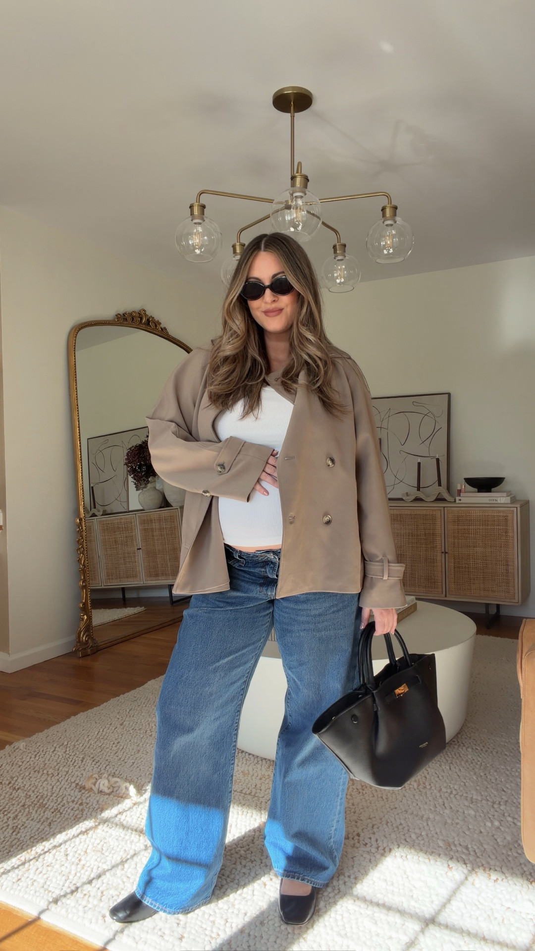 Spring outfit math! Size up 1 in tank (L). Sized up 3 in jeans for pregnancy. Size down 1 in trench (S). 

Pregnancy style, pregnancy outfits, spring outfits, cropped trench, simple
outfits, spring capsule, bump outfits

#LTKBump #LTKootd