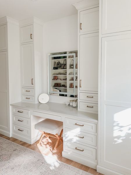 Primary bedroom closet vanity details! Loving a closed drawer system for this area of my closet to store makeup and other storage items 

Home organization, spring refresh, primary bedroom closet, aesthetic closet, creamy whites, natural wood tones, vanity mirror, vanity stool, aesthetic storage, gold mirror, light and bright, Amazon Prime, found it on Amazon, Target, gold detail, shop the look!

#LTKhome #LTKstyletip #LTKSeasonal