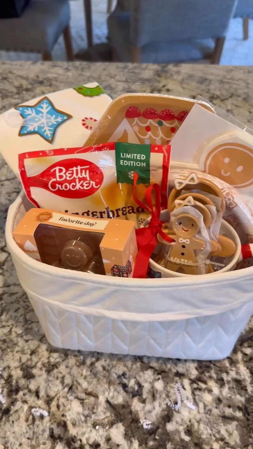Gift Basket idea for the Baker! Gingerbread man themed gift basket. Cookie mix, gingerbread plates and napkins, kitchen towel, hot chocolate bomb, mug, gingerbread measuring spoons.
#baking #giftbasket #giftidea #giftforher #christmasgift



#LTKSeasonal #LTKHoliday #LTKGiftGuide