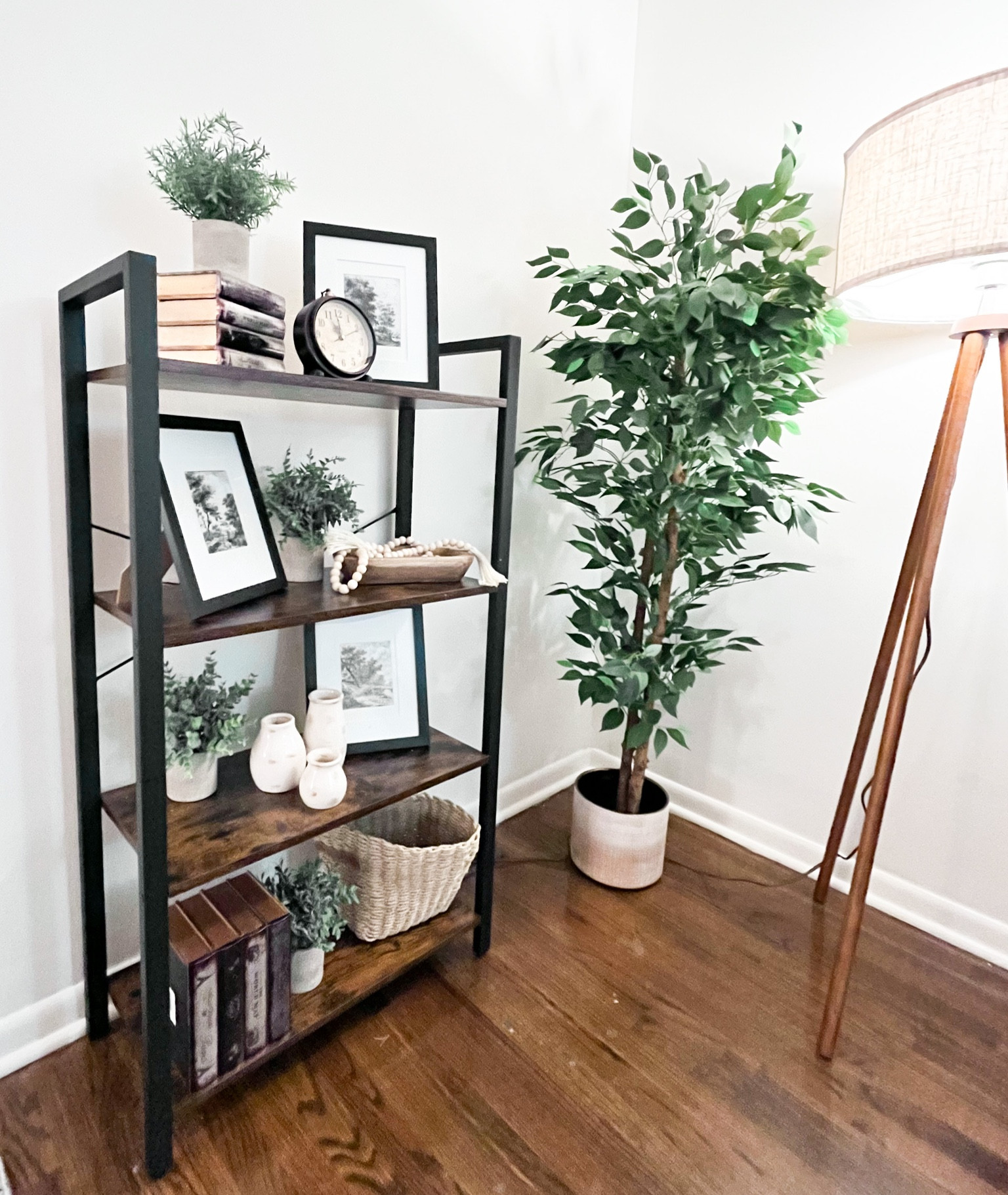My guest room bookcase and shelf decor. Tripod lamp. Faux tree