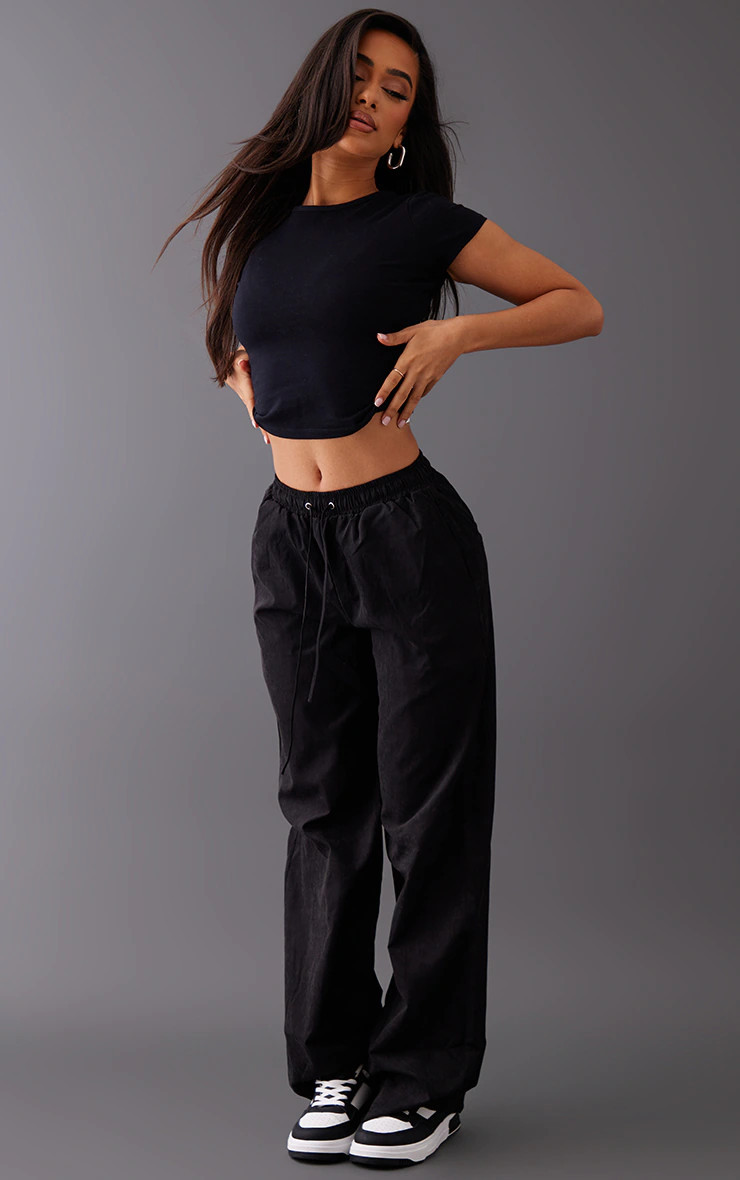 Petite Black Peach Skin Cargo Pants | PrettyLittleThing US