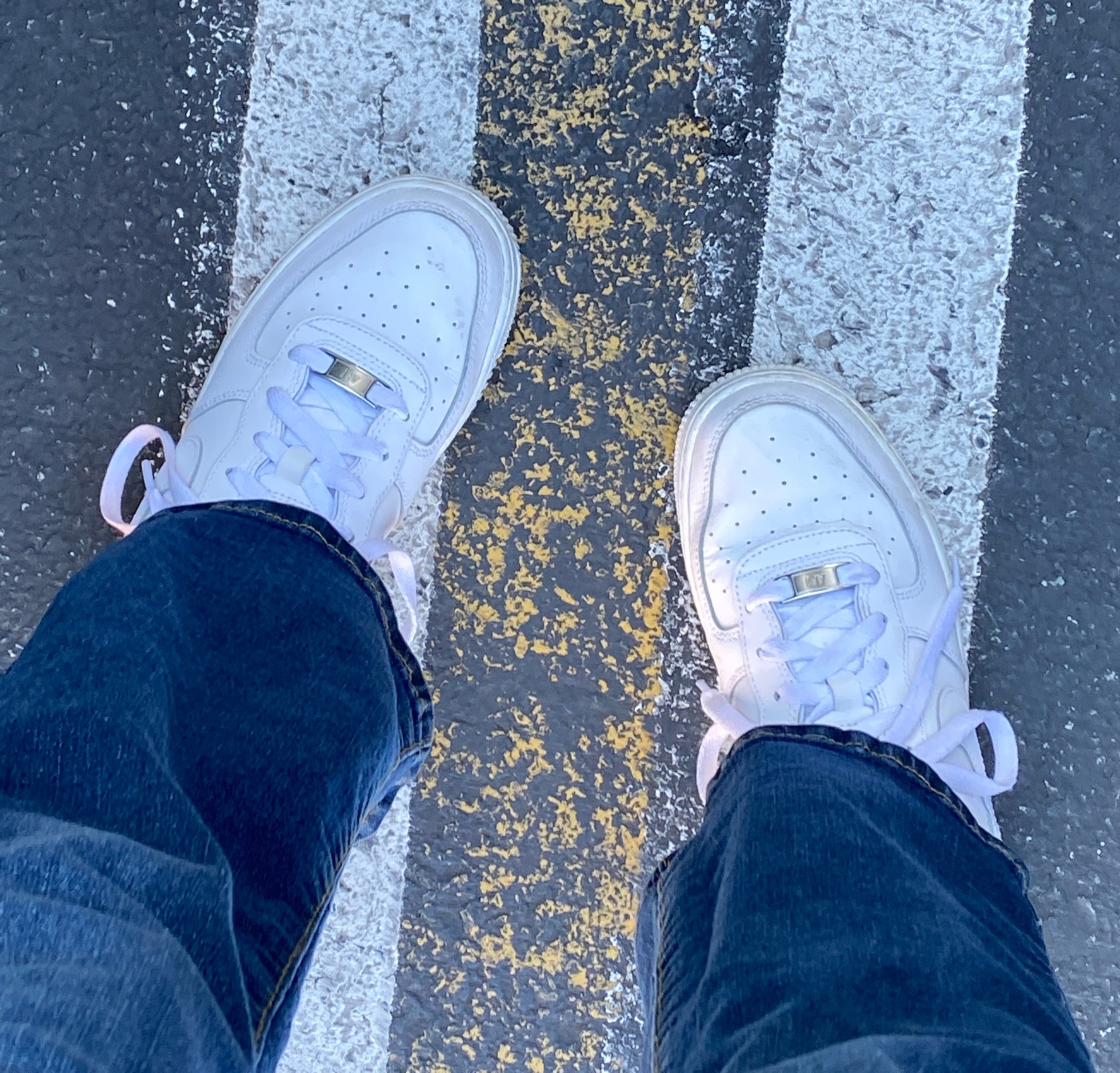 White sneakers and dark blue wash flared denim jeans. 

#LTKstyletip #LTKfit #LTKshoecrush